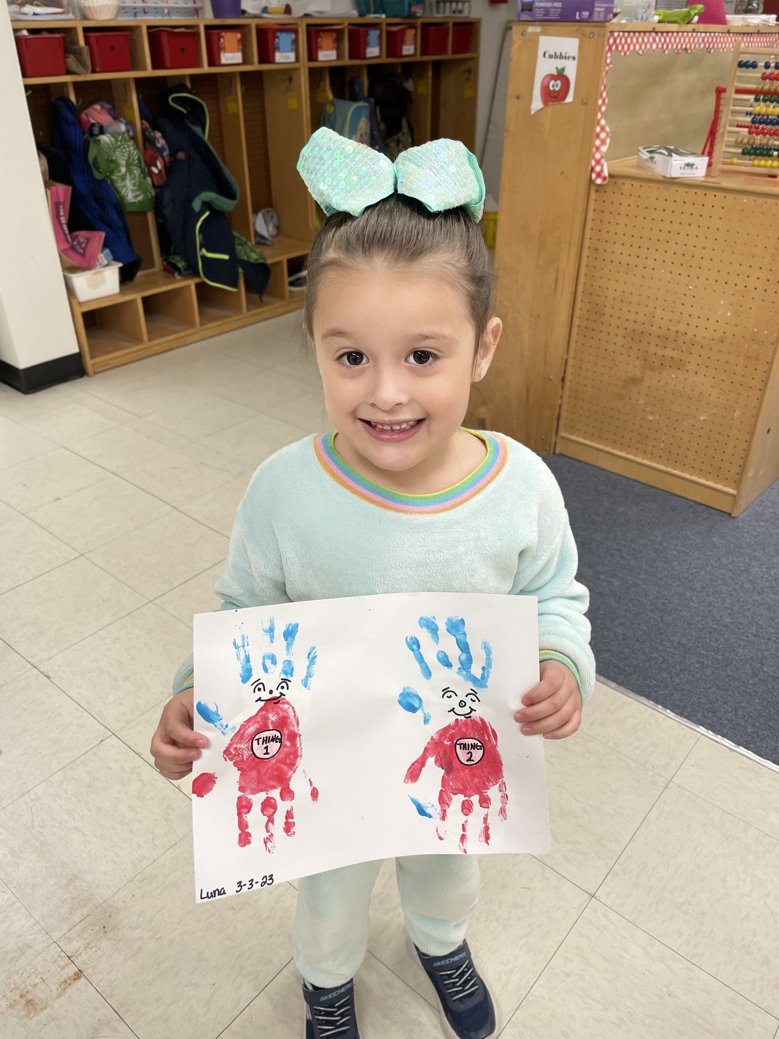 Ms. Centeno reported, "Lincoln 3 year old class Celebrated Dr. Seuss week by hand painting Thing 1 and Thing 2. " 