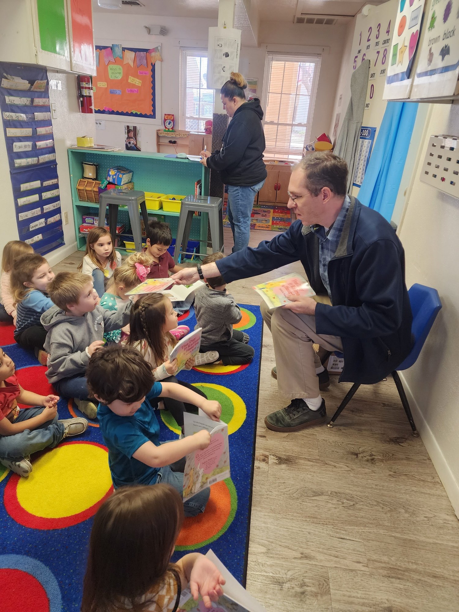  Ms. Beeson, Mangum School Supervisor reported, "Joseph from the Margaret Carder Library came to read the book "The Day it Rained Hearts" and to give each kid a book to take home."  Head Start loves the Library! 