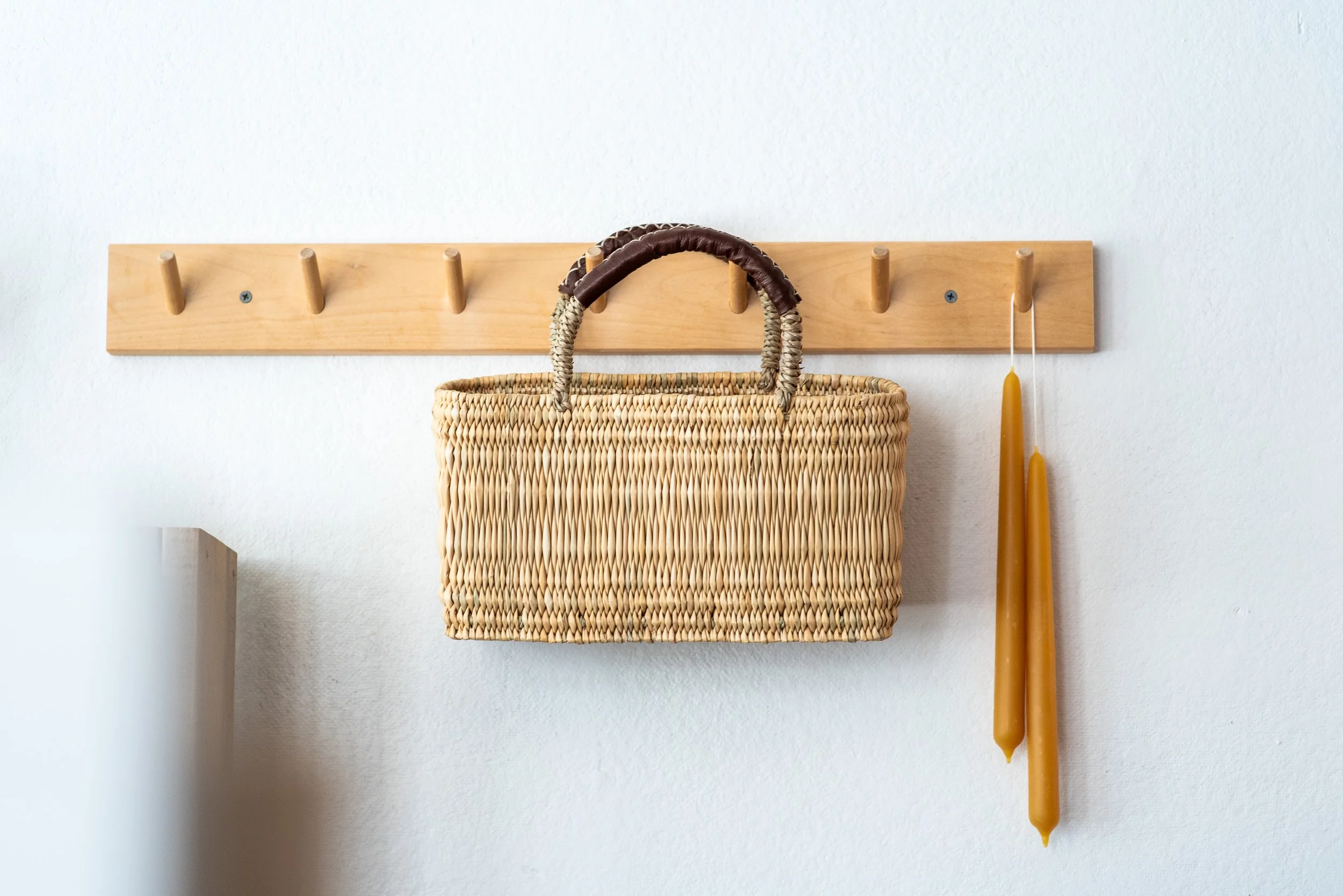 basket-hanging-on-wooden-hook.jpg