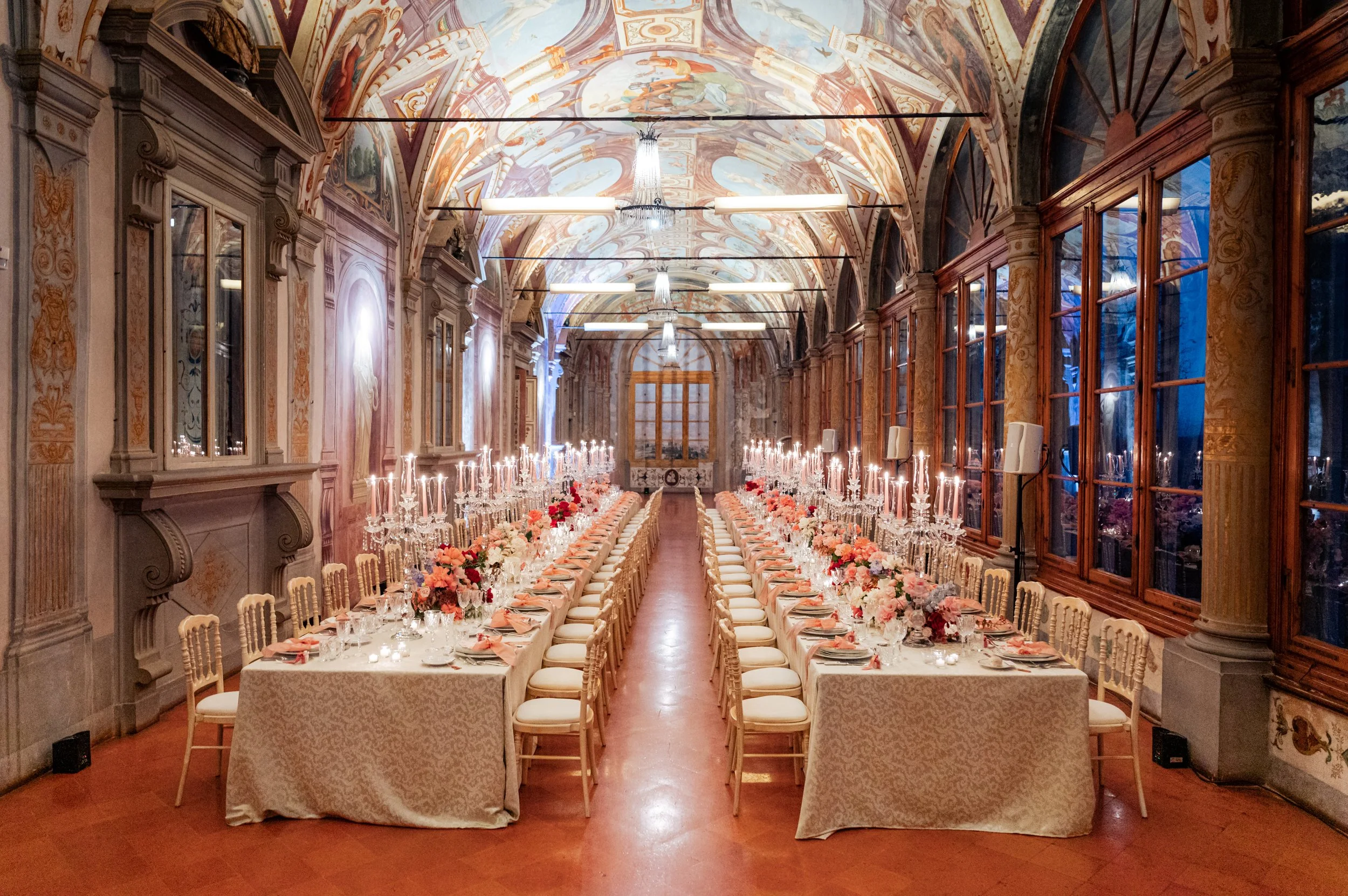 Romantic bespoke wedding day stationery at Villa Corsini a Mezzomonte, Florence, featuring hand-painted rose illustrations, shaped menus, and tassel place cards.