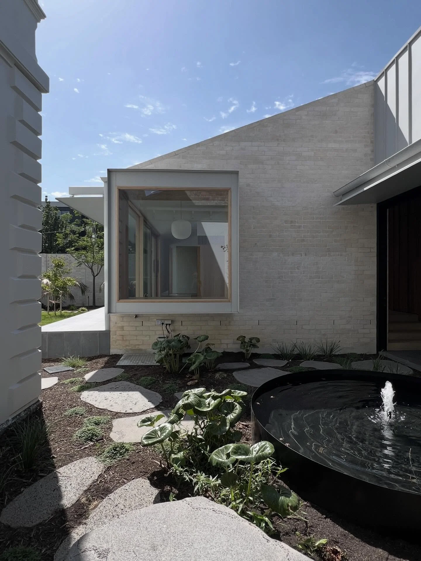 The previous renovation was removed to reveal and celebrate the heritage tower and create a &lsquo;secret&rsquo; courtyard between old and new.

Architecture: AWA in collaboration with client.
Interiors: AWA with Cantilever Interiors.
Builder: Riser 