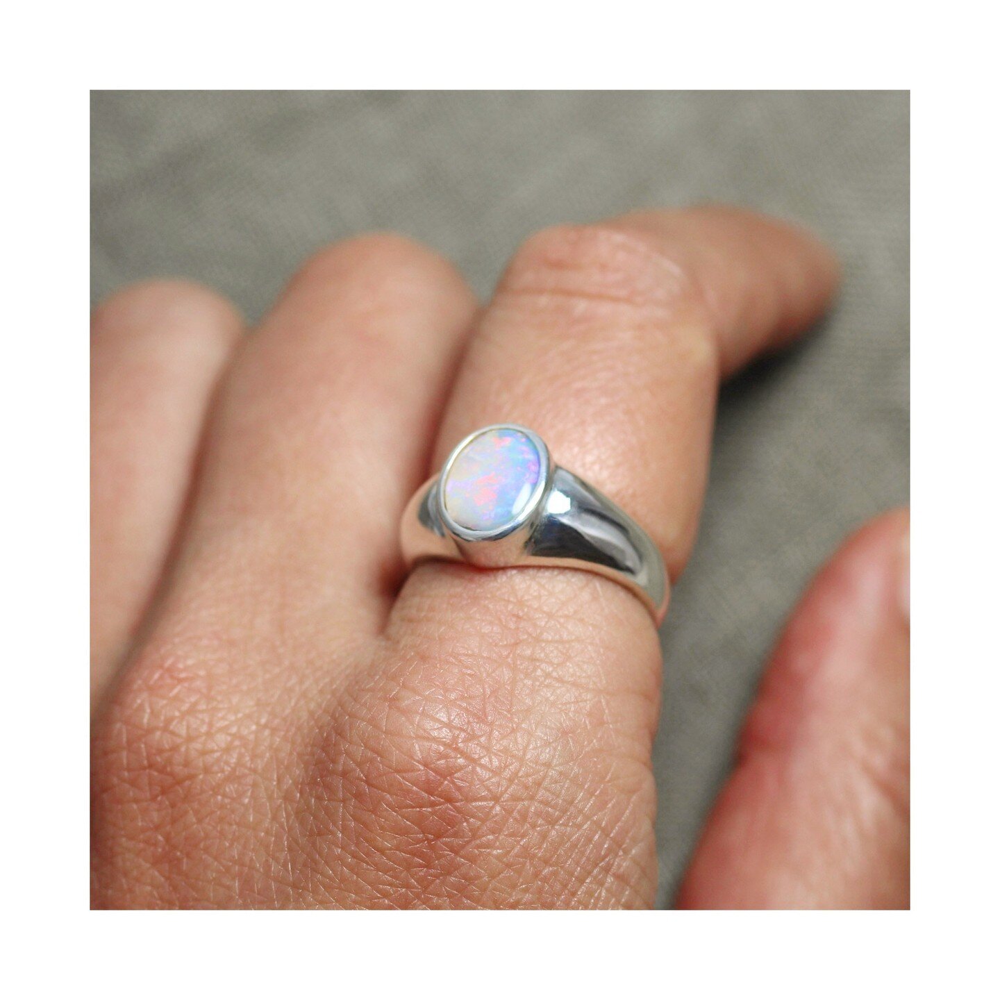 S O P H I A, the newest addition to our collection, is a bold signet style ring with an elegantly tapered shank in sterling silver and bezel set with a softly understated 0.7ct crystal opal. Available now in size O 1/2

#opaljewellery #opallove #opal