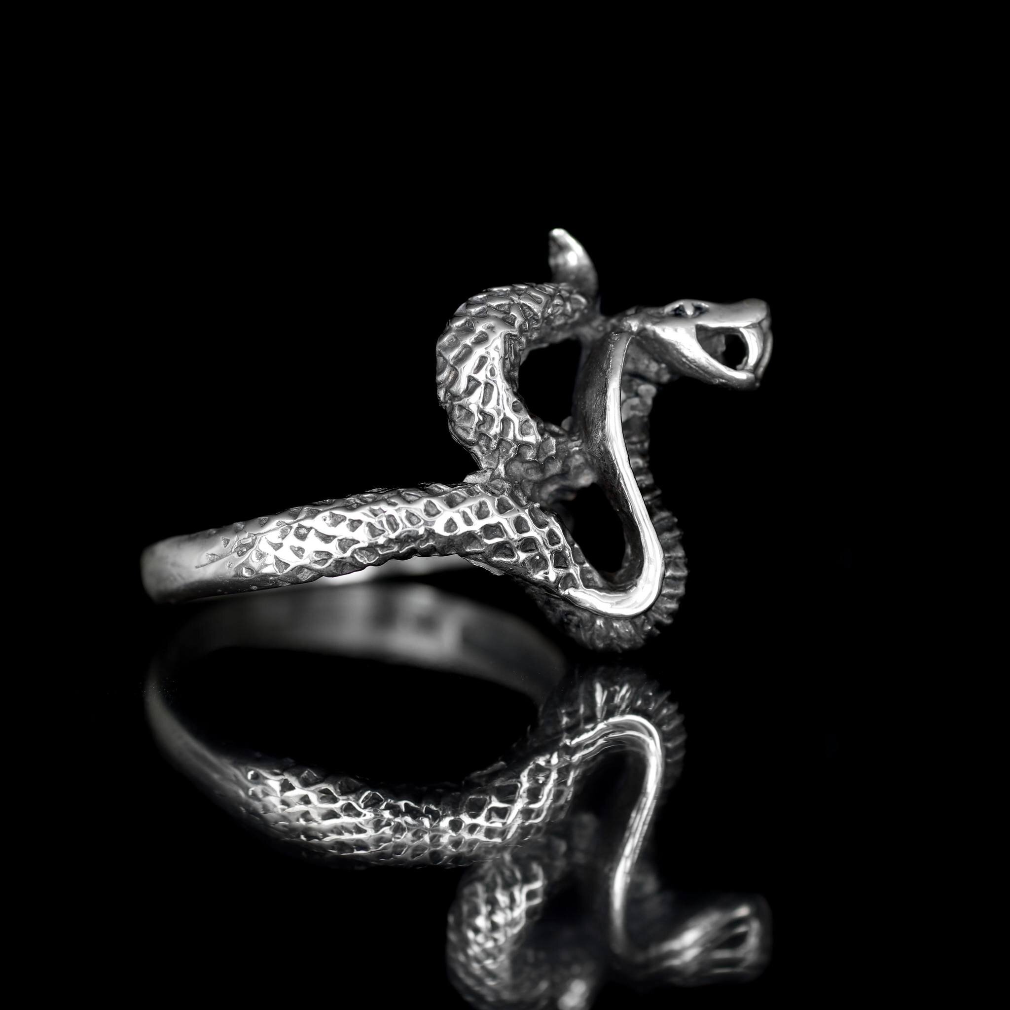 Detailed scales and fangs make for a standout ring without the heft that some of our other statement pieces carry. 
#cobra #snakering #bikerring #silver925