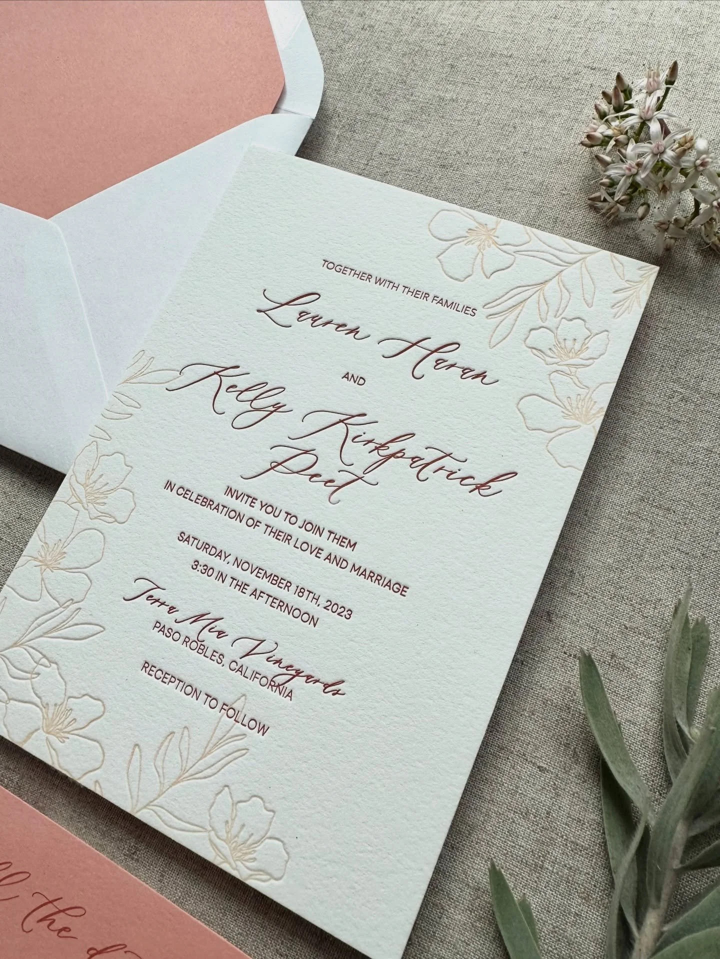 A soft blush palette, hand-drawn delicate botanicals and the dreamiest vineyard venue for K+L