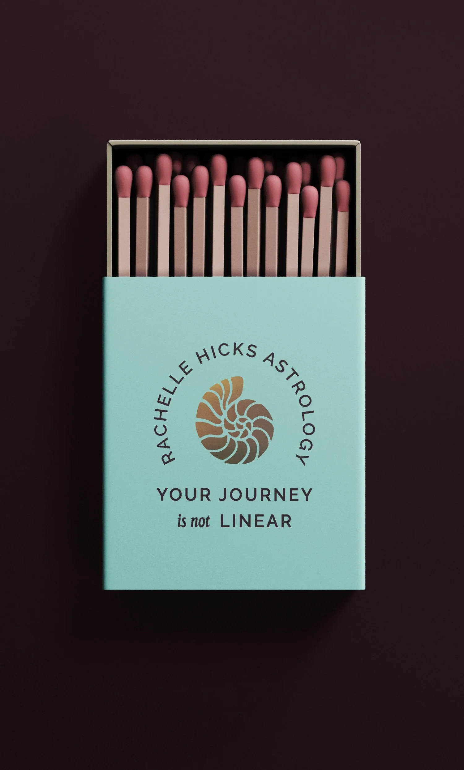 Rachelle Hicks Astrology matchbox design with pink matches and shell-inspired gold foil logo designed by Moonstone Creative