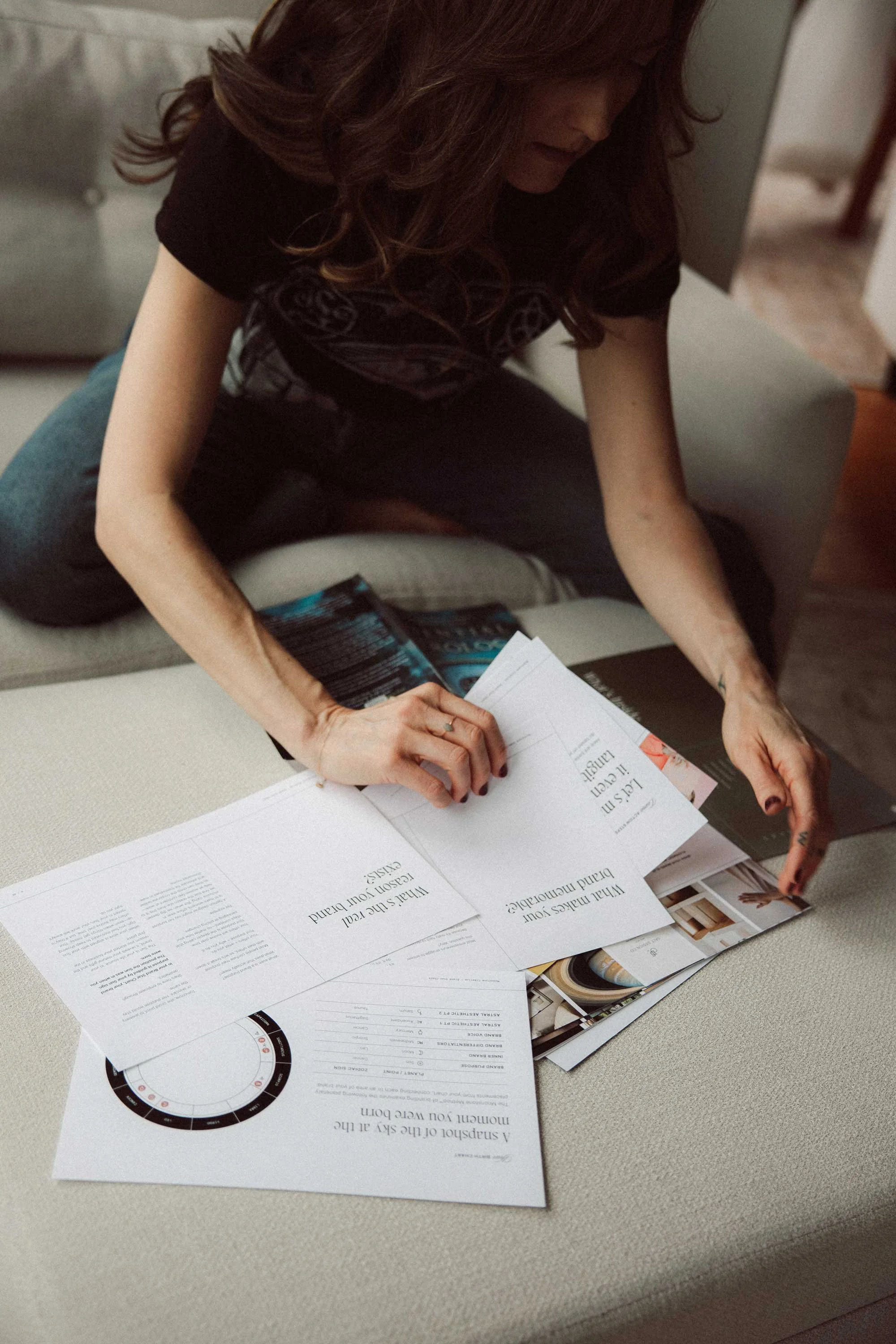 Miranda reviewing Brand Star Chart pages as part of Moonstone Creative’s branding and web design services