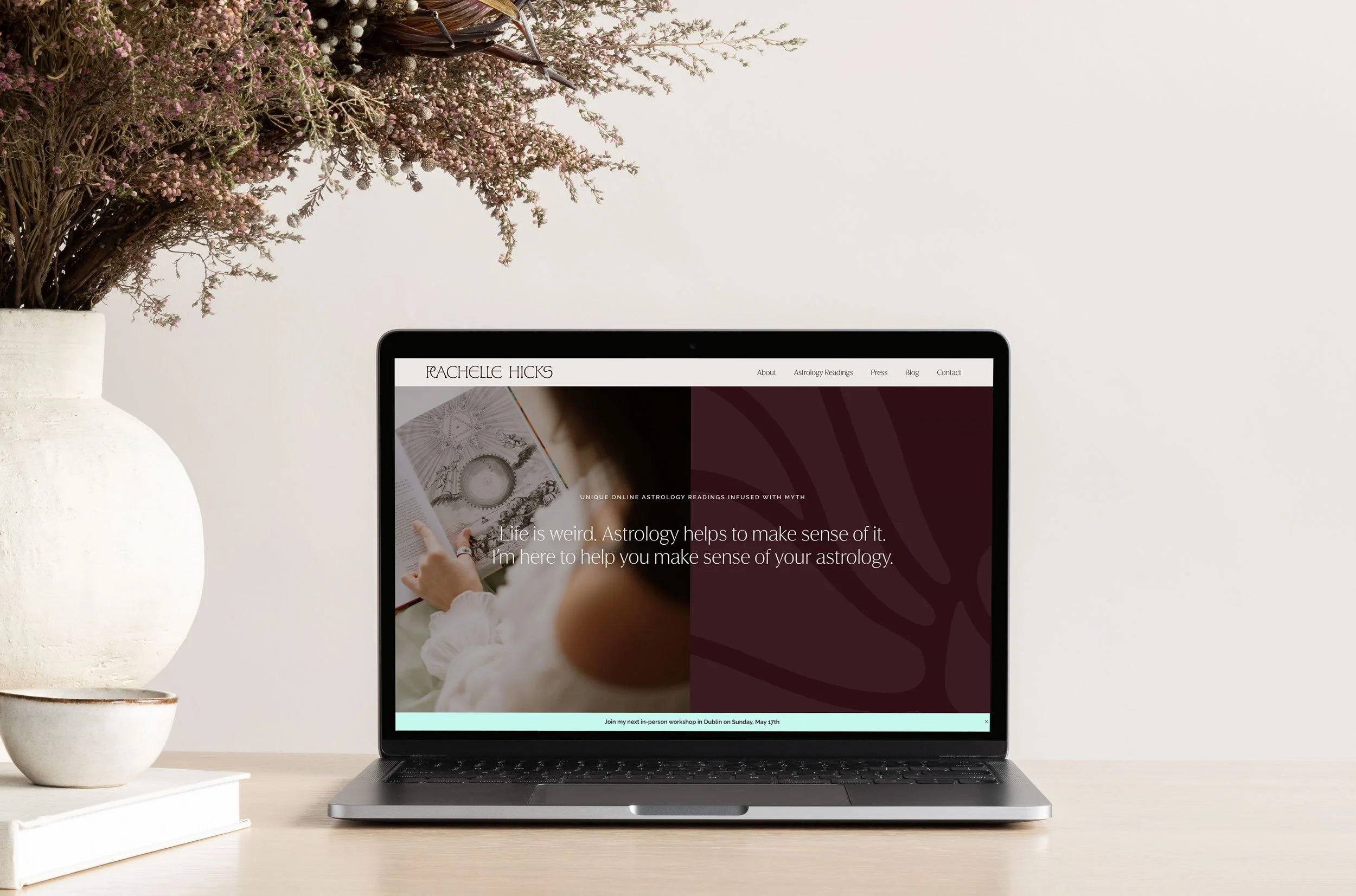 Professional branding and custom website design for Rachelle Hicks Astrology displayed on a laptop mockup