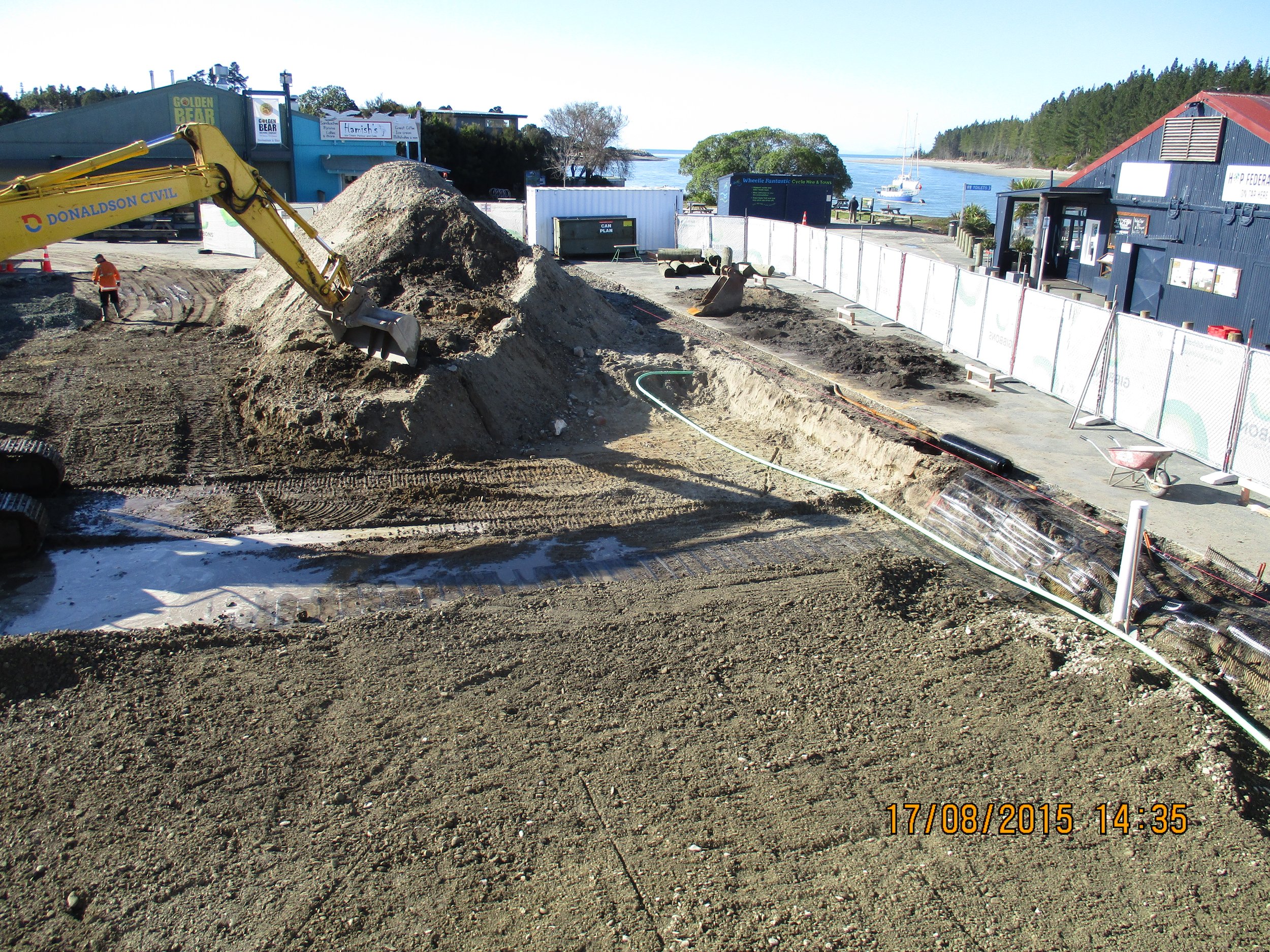  Installing  geogrid reinforced gravel raft and drains to mitigate liquefaction 
