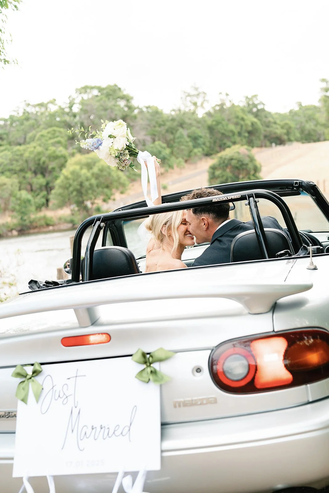perth and south west wedding photographer, Natalie Jane, capturing couples portraits at Meelup Farmhouse, duns borough, with a vintage inspired car