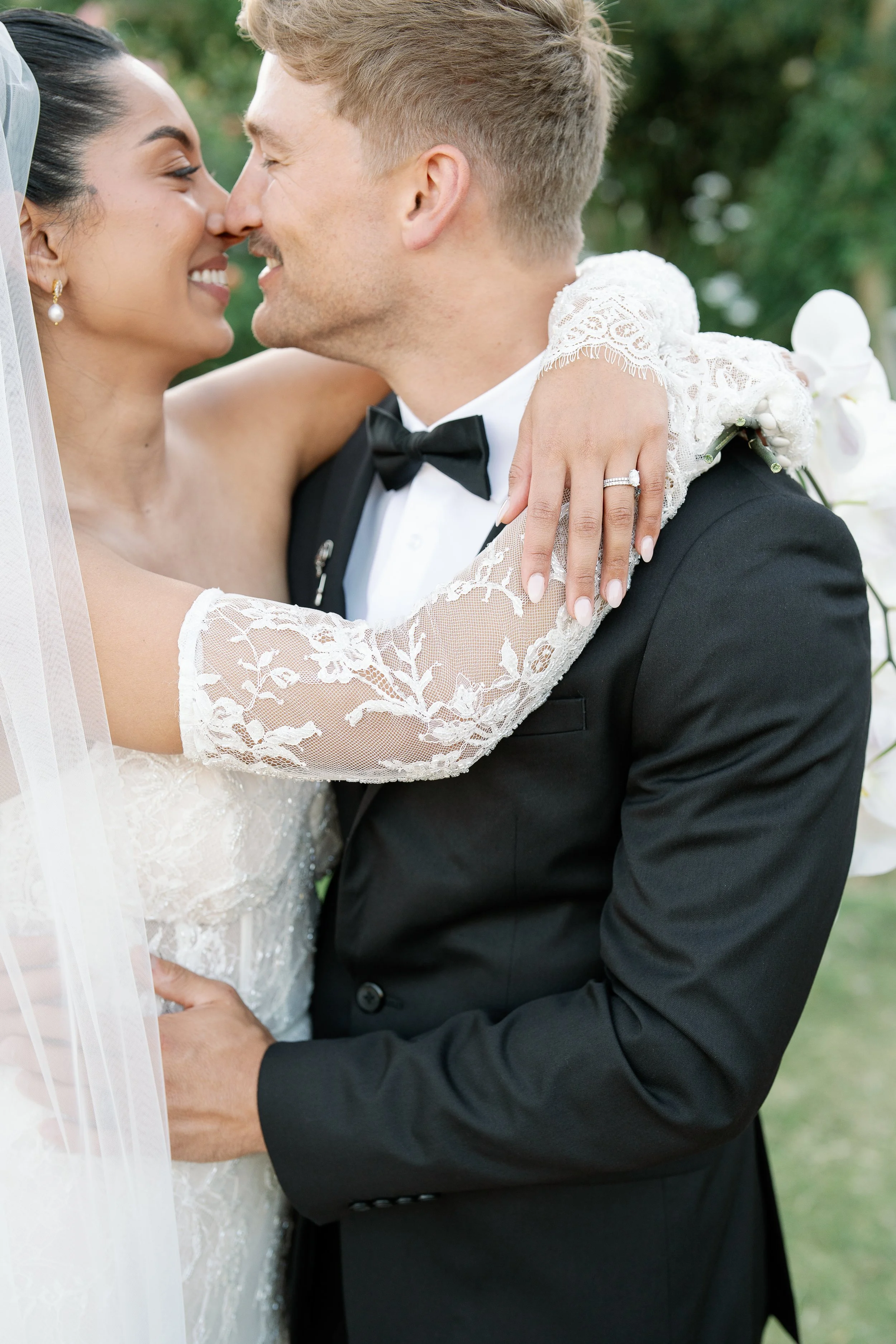 Couples portraits in Italian inspired gardens of MasonMill, a wedding venue in Perth Hills. The brides wedding dress with gorgeous lace sleeves, captured in an authentic, natural way by Perth editorial wedding photographer, Natalie Jane