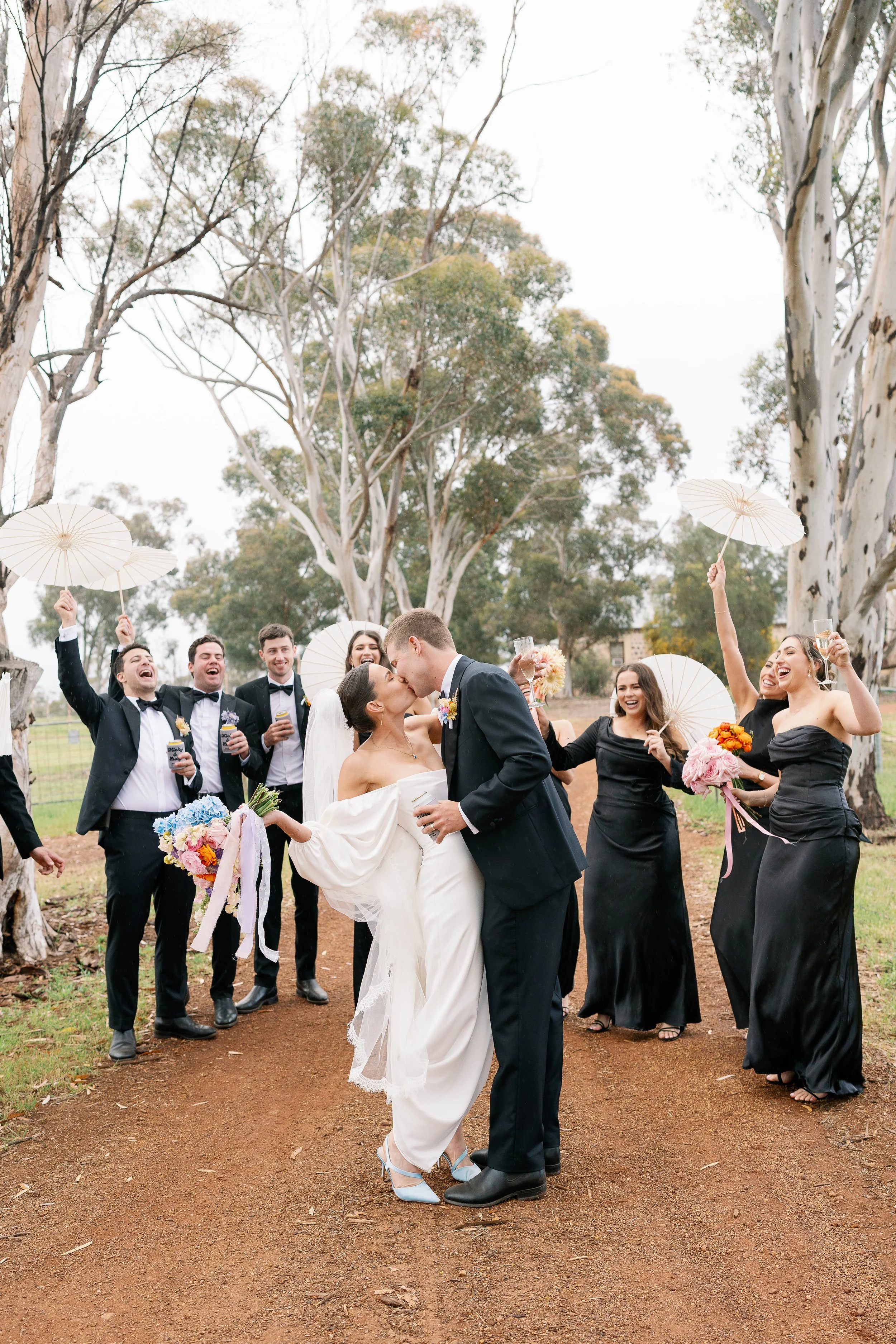 bridal party portraits taken by Perth Wedding Photographer, Natalie Jane, at a private property in Walebing, Western Australia. The bride and groom were relaxed and laid back, making their wedding photos a fun experience.