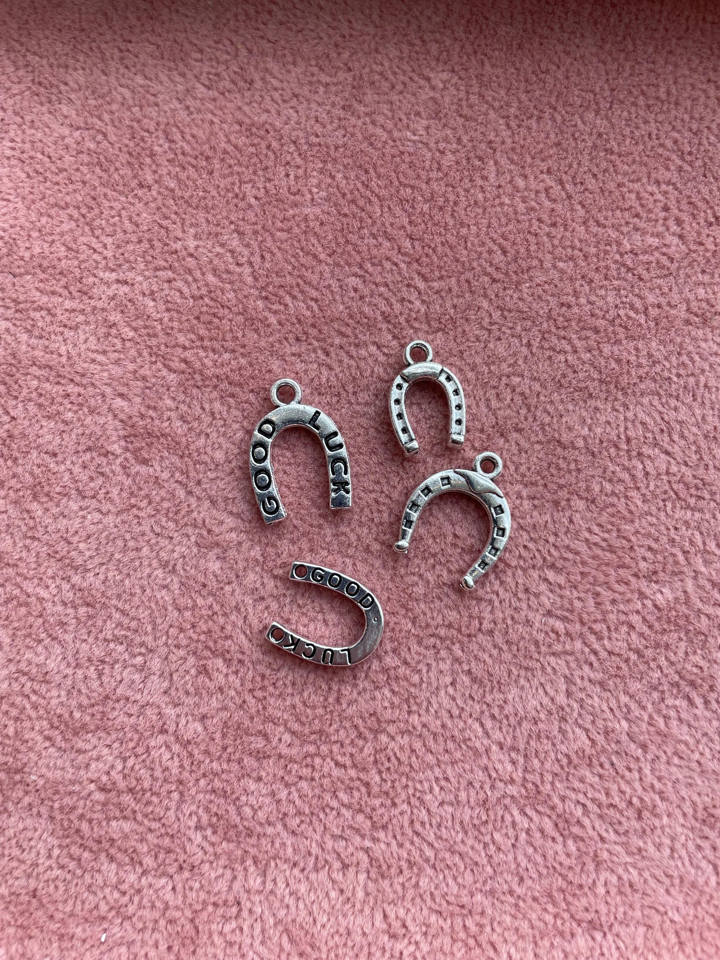 You spoke, I listened and we now have silver charms! I started off with the gold coloured charms and there were lots of different ones available.

 Silver coloured charms were not as easily sourced. However, I have now got lots of beautiful silver ch