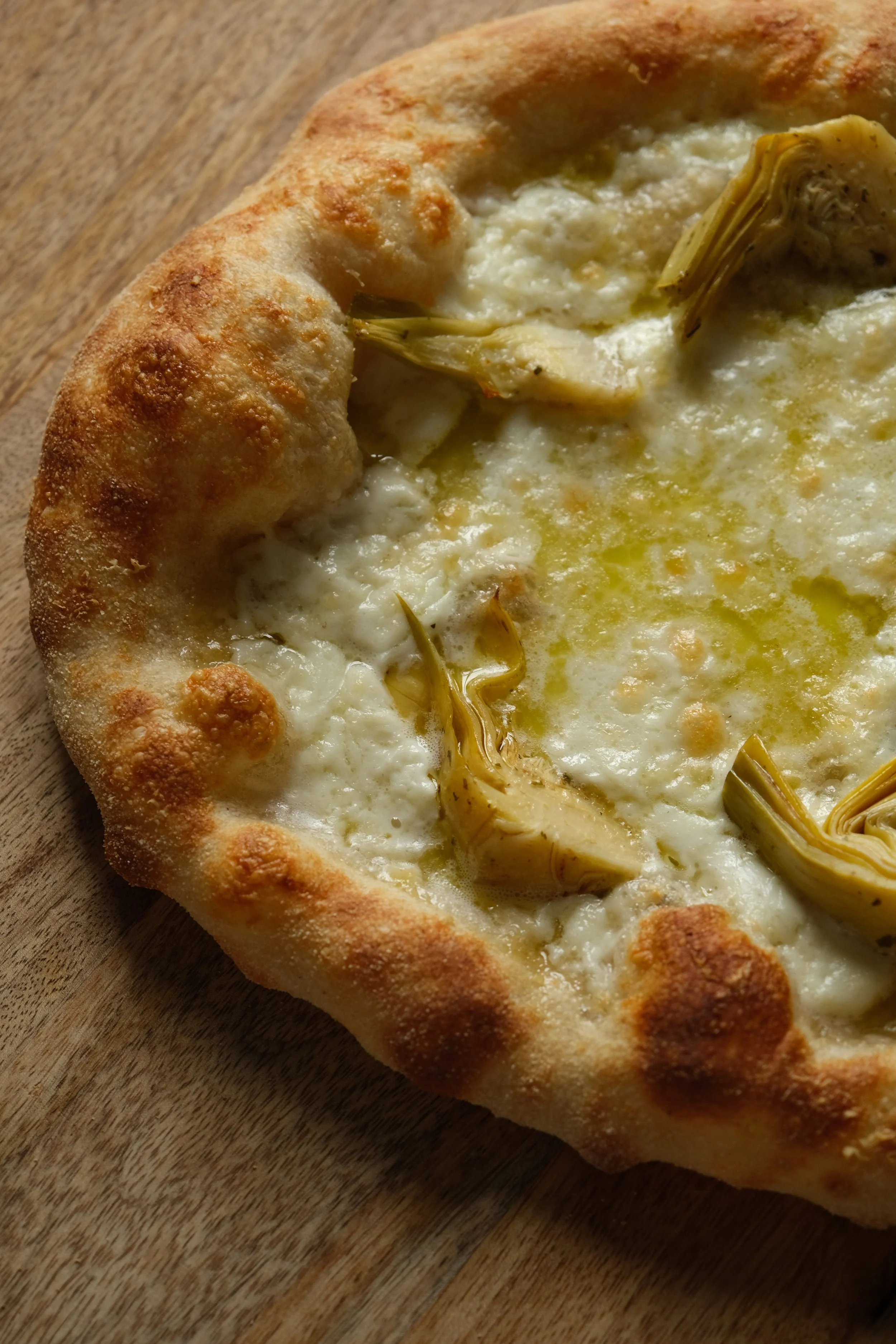 Moment convivial à la fin de l’atelier pizza à Nantes. Dégustation des pizzas préparées sur place et verre de Prosecco pour tous les participants.
