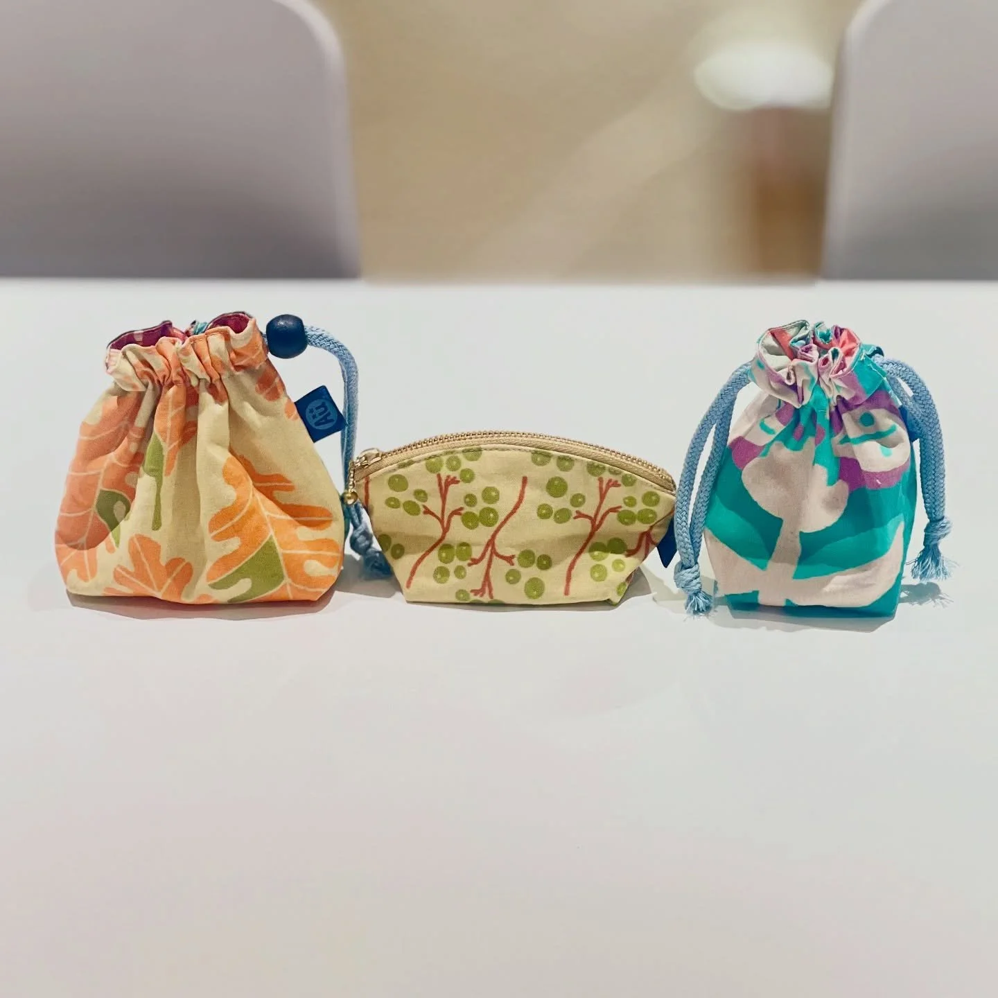 I made these mini pouches using fabric with my own textile designs from @spoonflower .

Each piece shows a different part of the pattern, so the colors and shapes look a little unique.
I hope you enjoy the handmade feel and the mood of my original fa