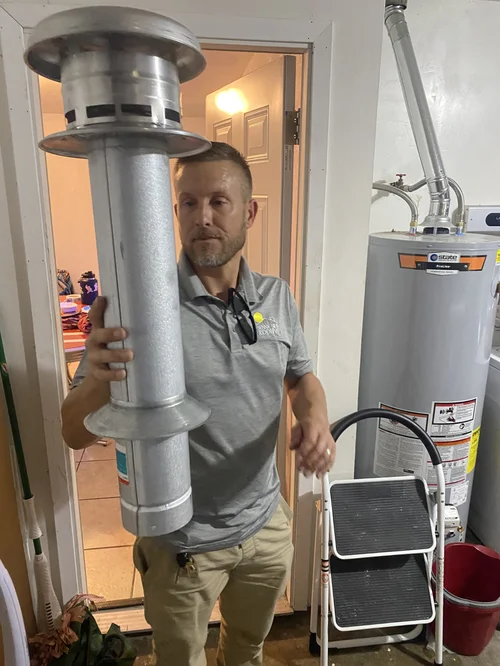 Water heater vent pipe cut in. Roof repair in fort-worth. HVAC pipe jack  assistance. — SunnySideRoofing recent roof repair or roof replacement