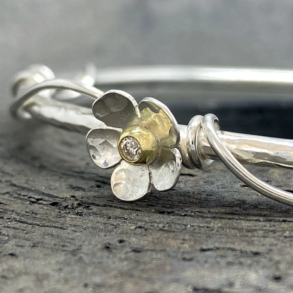 Silver, gold and diamond Forget-me-not bangle