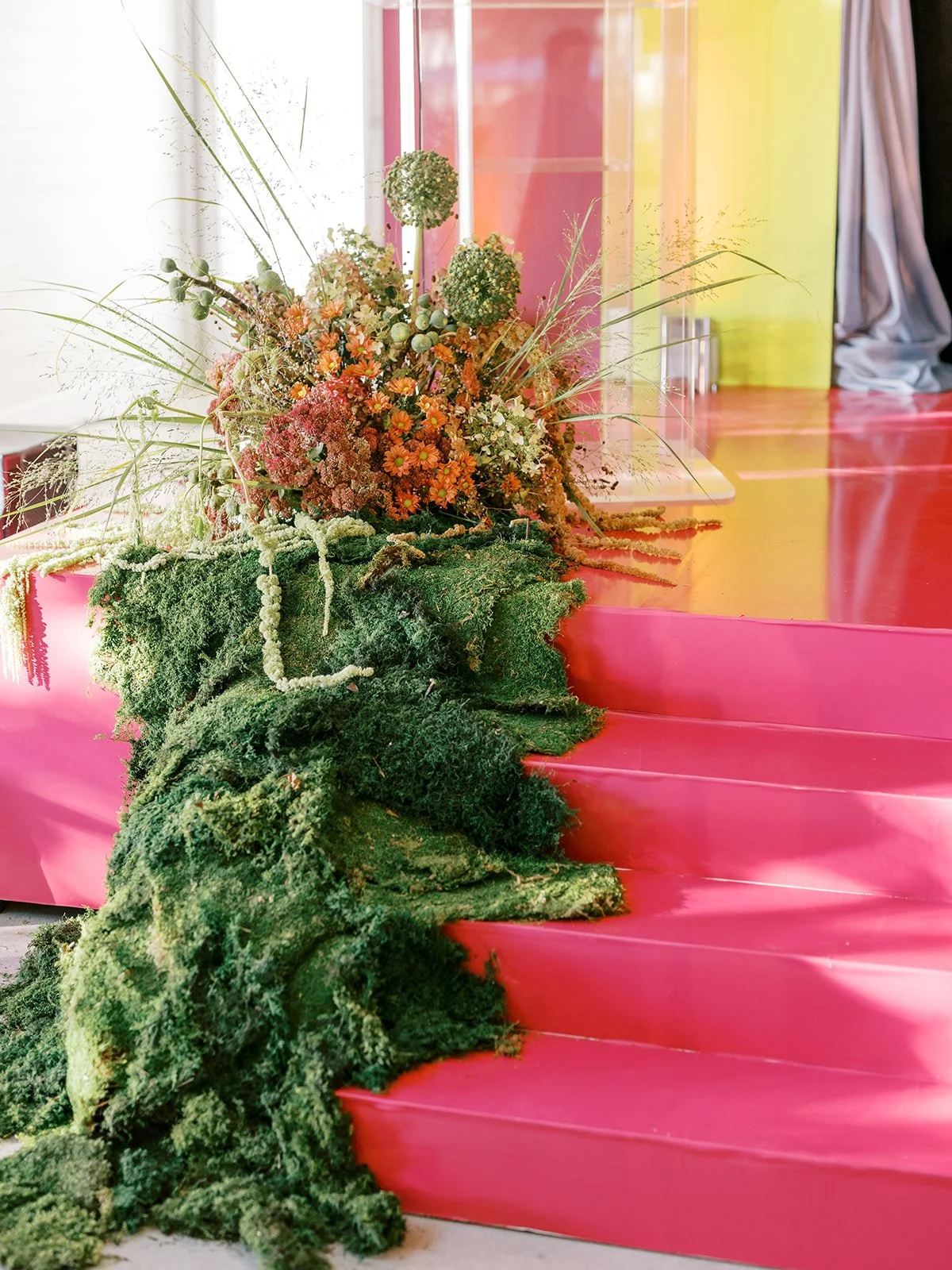 Bold Stage Floral Design with Faux Moss for Brand Activation