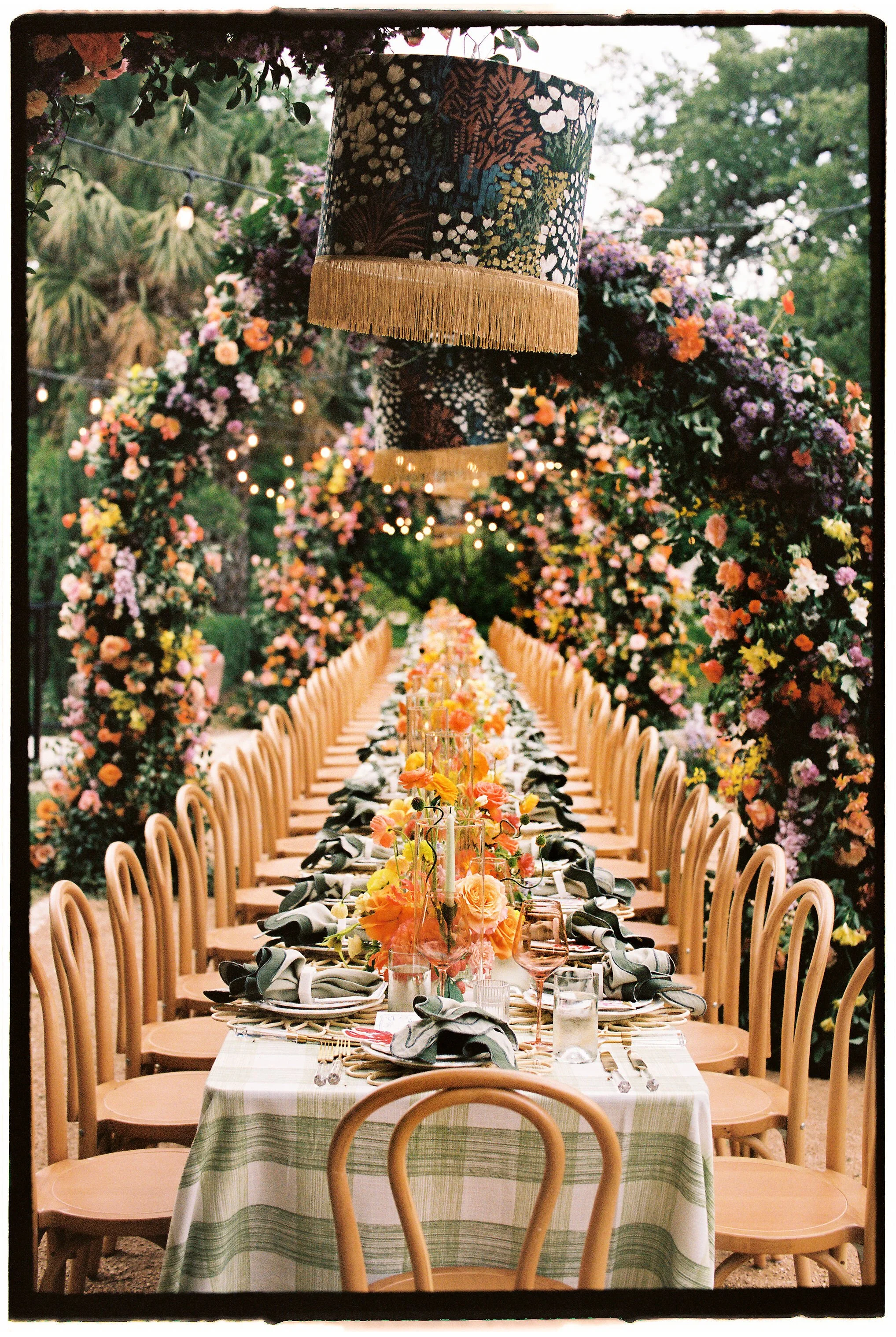 Maximalist Wedding Reception Under Hanging Florals
