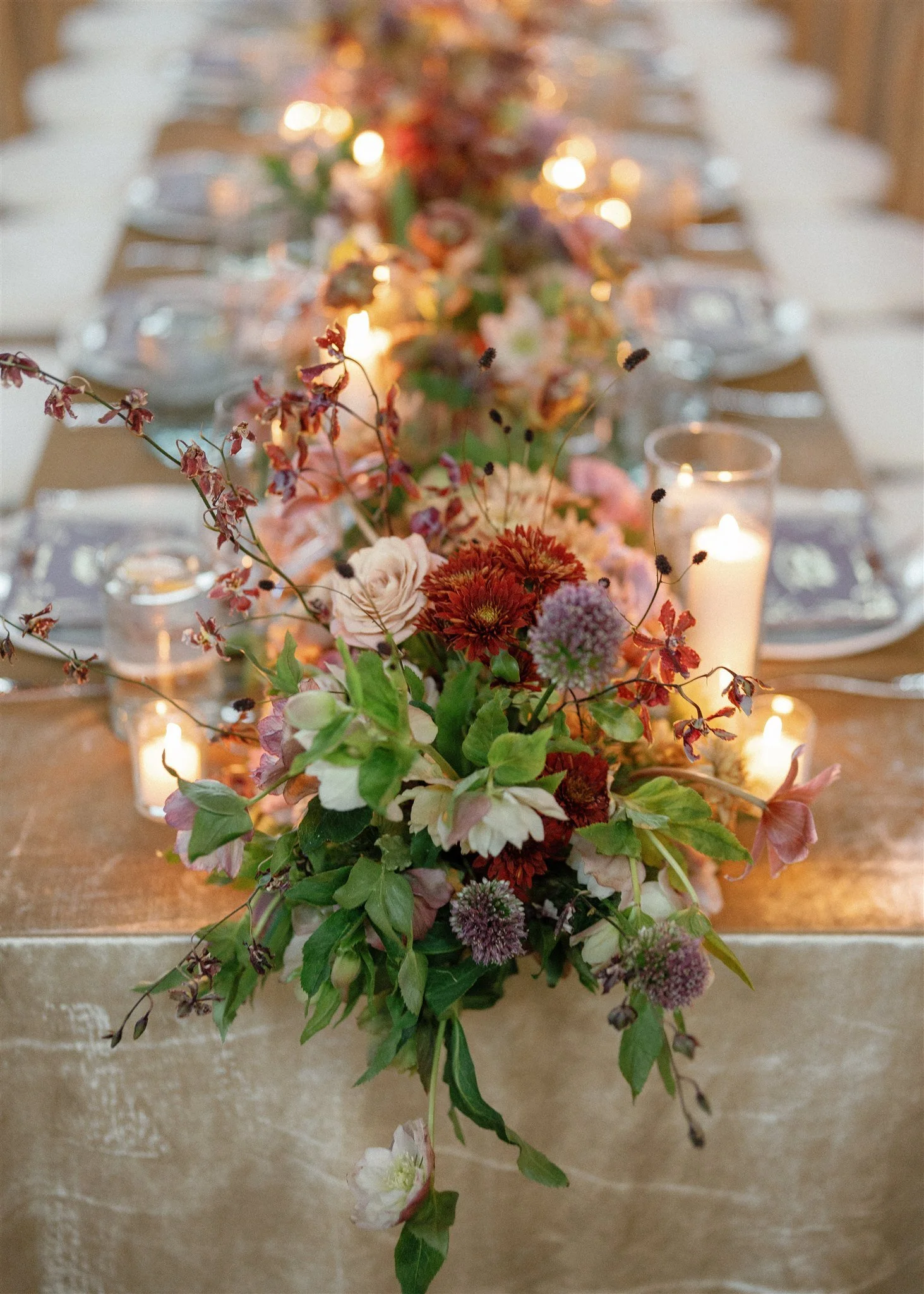  A floral table runner with a range of textures and foliage. 