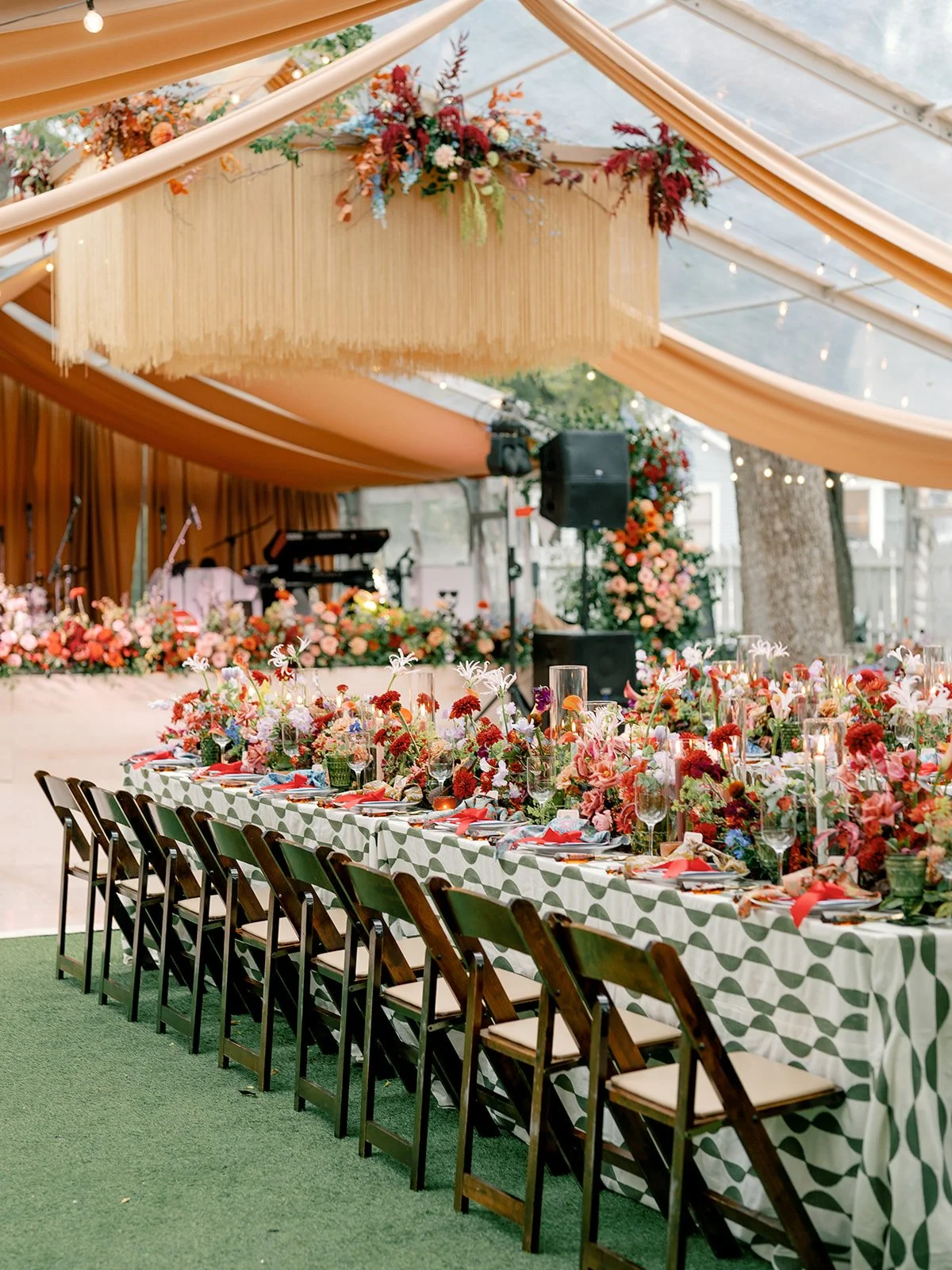  A luxury tent wedding with florals at every turn, including hanging from the ceiling. 