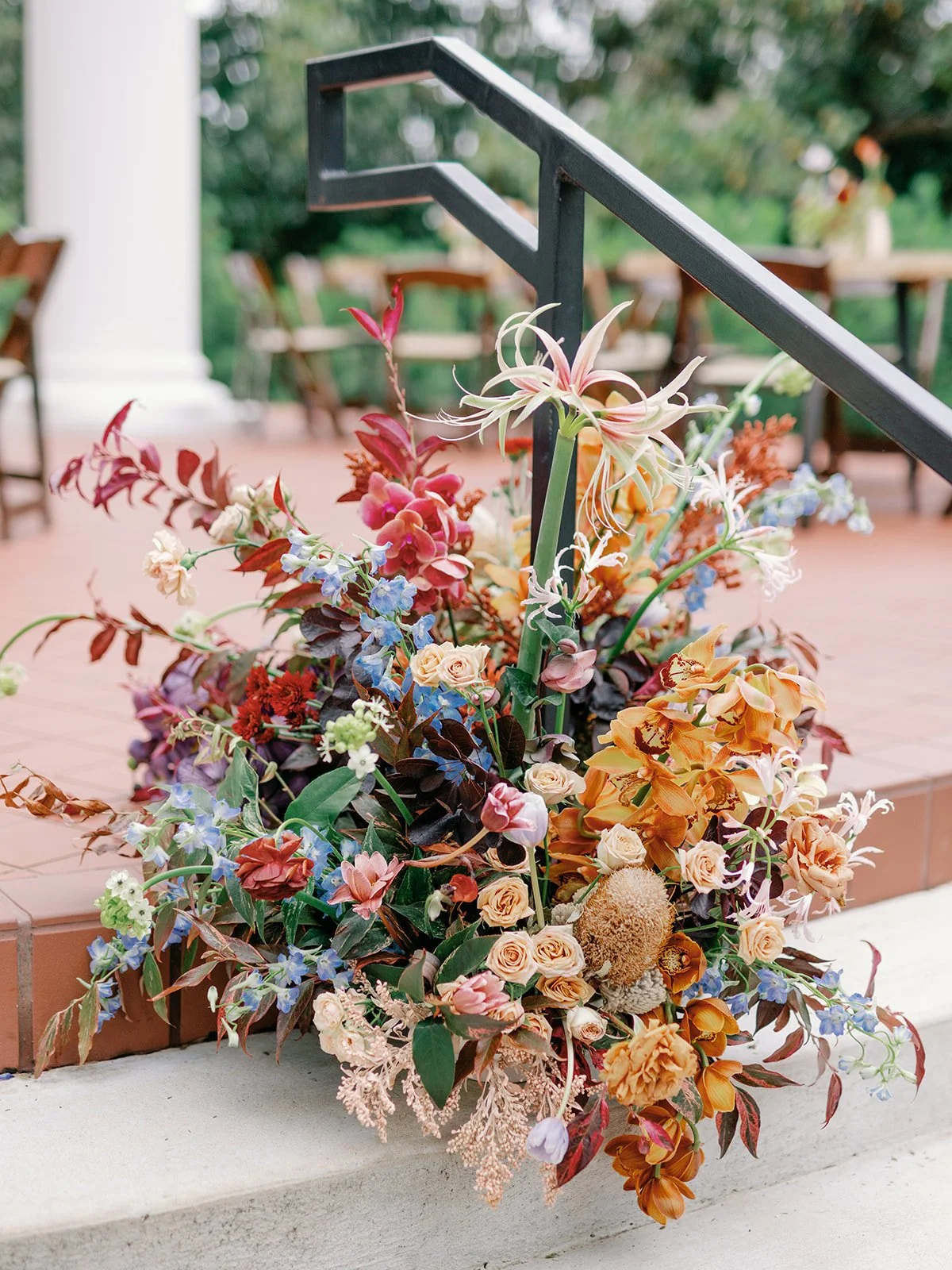  A unique autumn floral design adorning the staircase. 