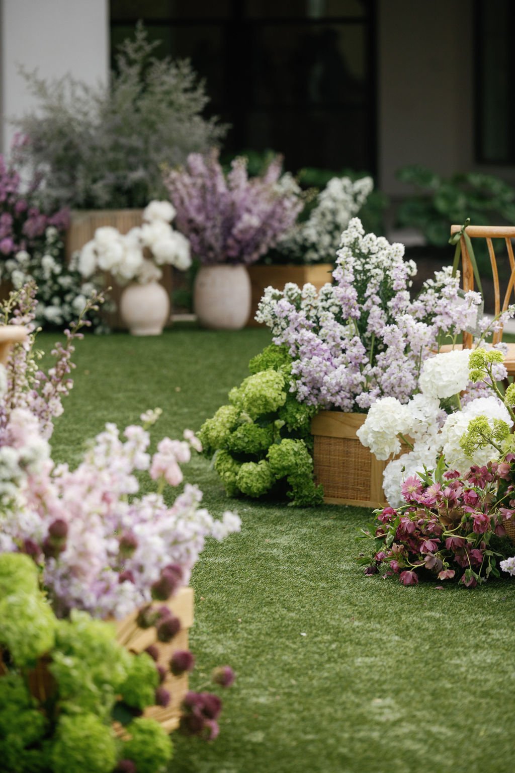  Purple hues and white florals are perfect for this aisle. 