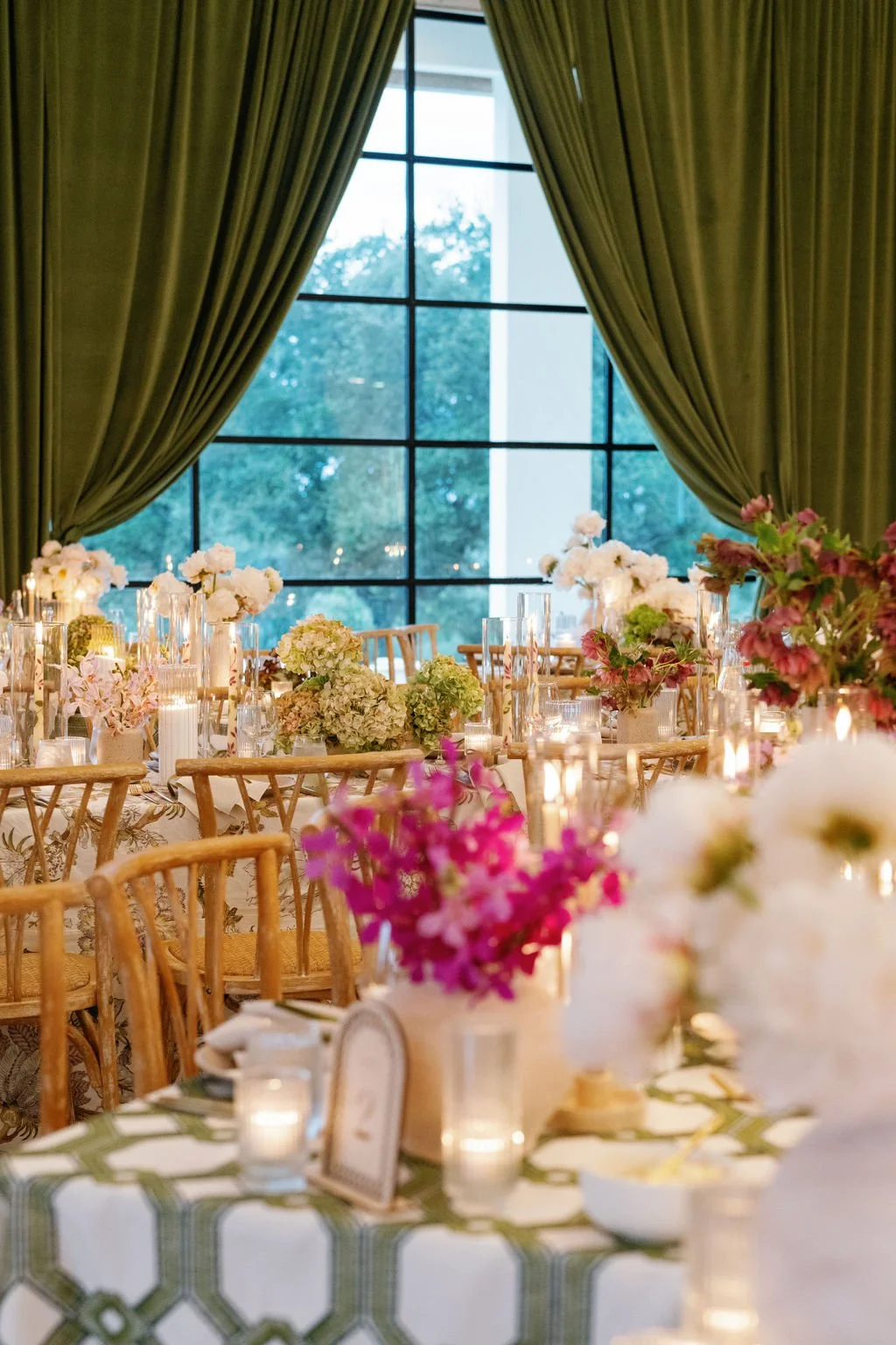  A candlelit wedding reception with monobotanical centerpieces. 