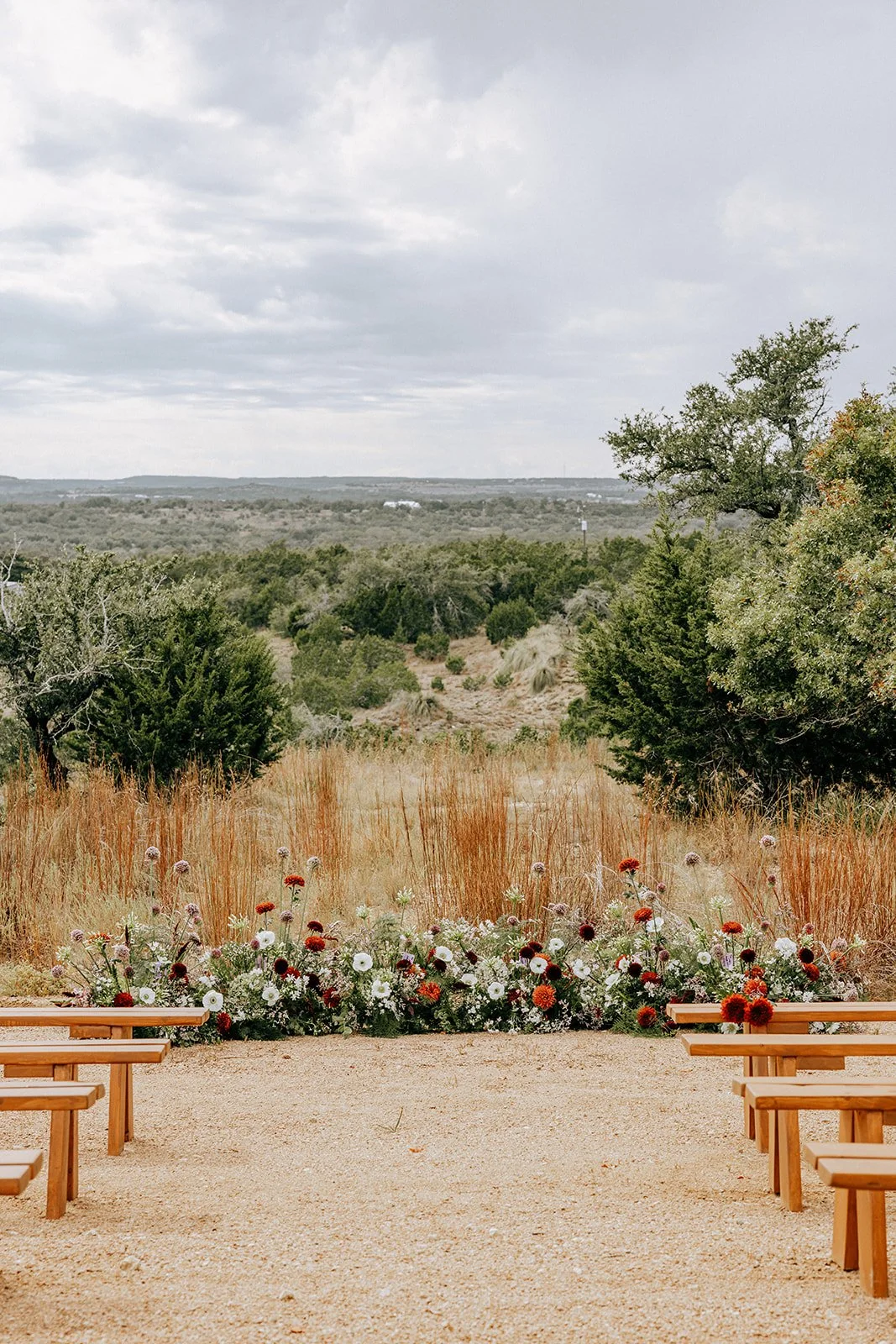  This outdoor Hill Country ceremony design was perfect for the season and the space. 