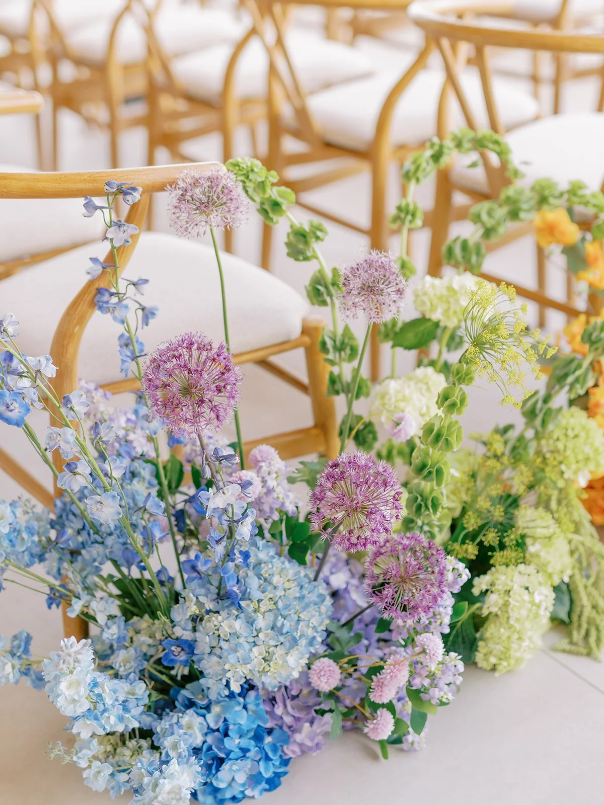  Rainbow style aisle flowers 