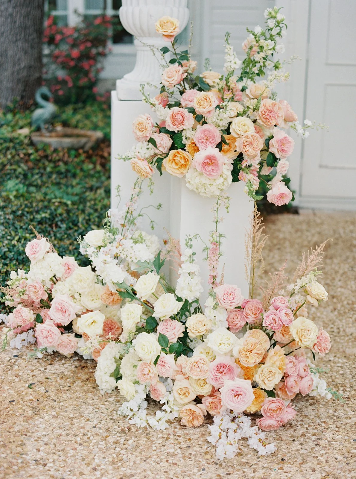  Garden rose ceremony arrangements on white pedestals at a Commodore Perry Estate wedding 