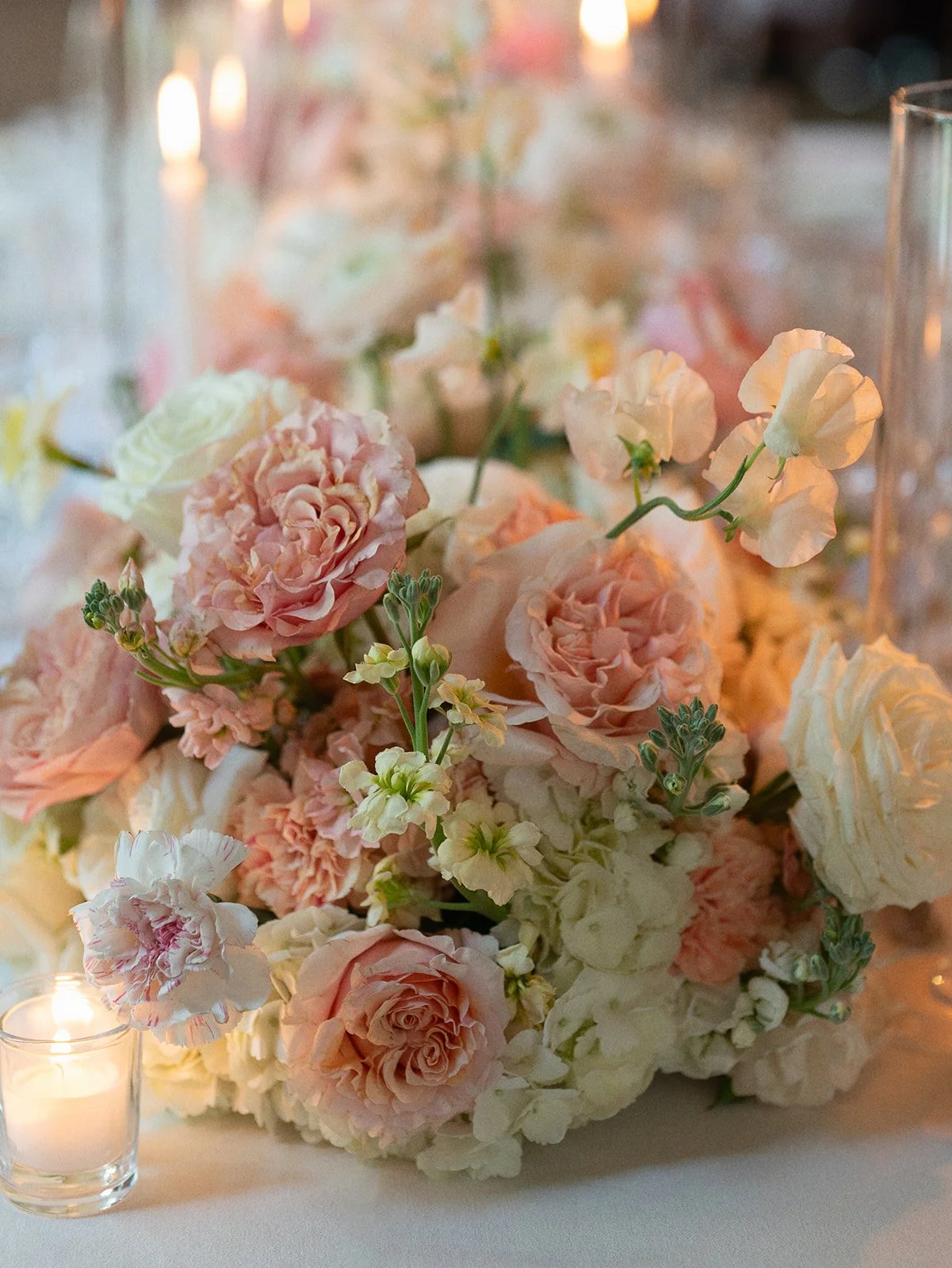  Romantic wedding reception florals with ranunculus, carnations and sweet peas by Remi + Gold at Commodore Perry Estate 