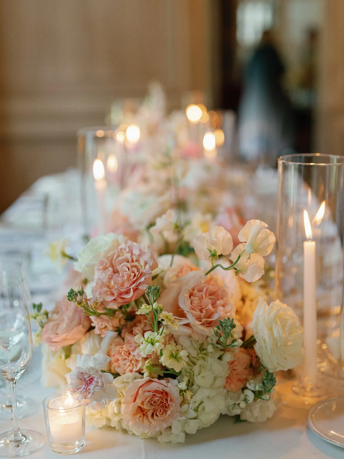  Lush floral table runner with garden roses and hydrangea at a Commodore Perry Estate wedding reception 