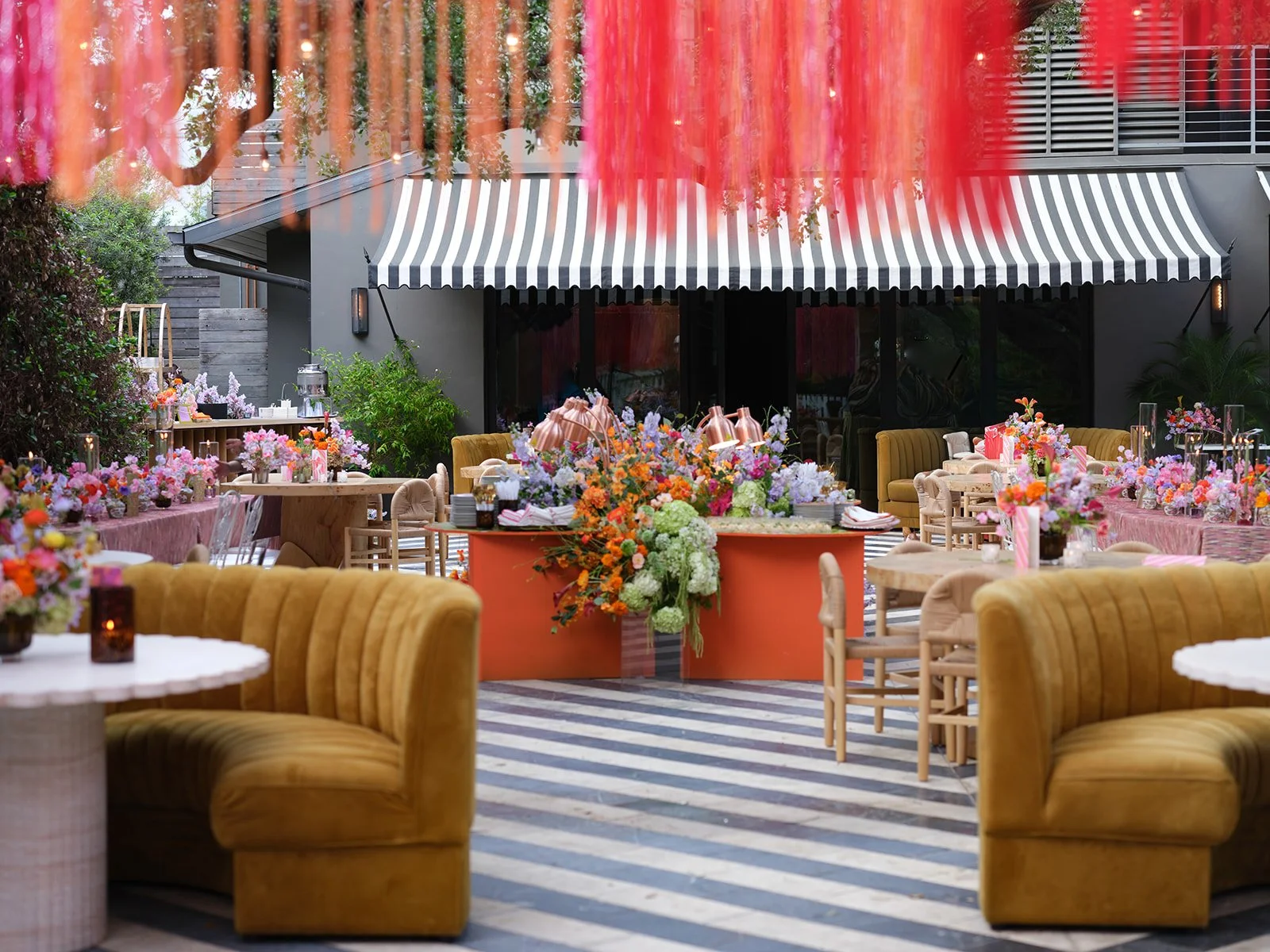 Hotel Saint Cecilia is one of Austin's best wedding venues because of the striped awnings and unique architecture.