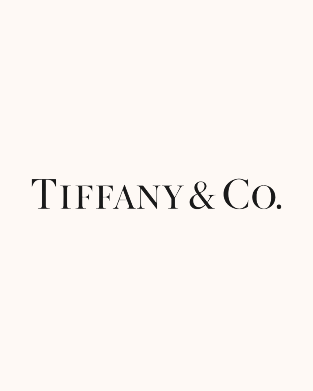 Tiffany & Co. logo on a cream background.