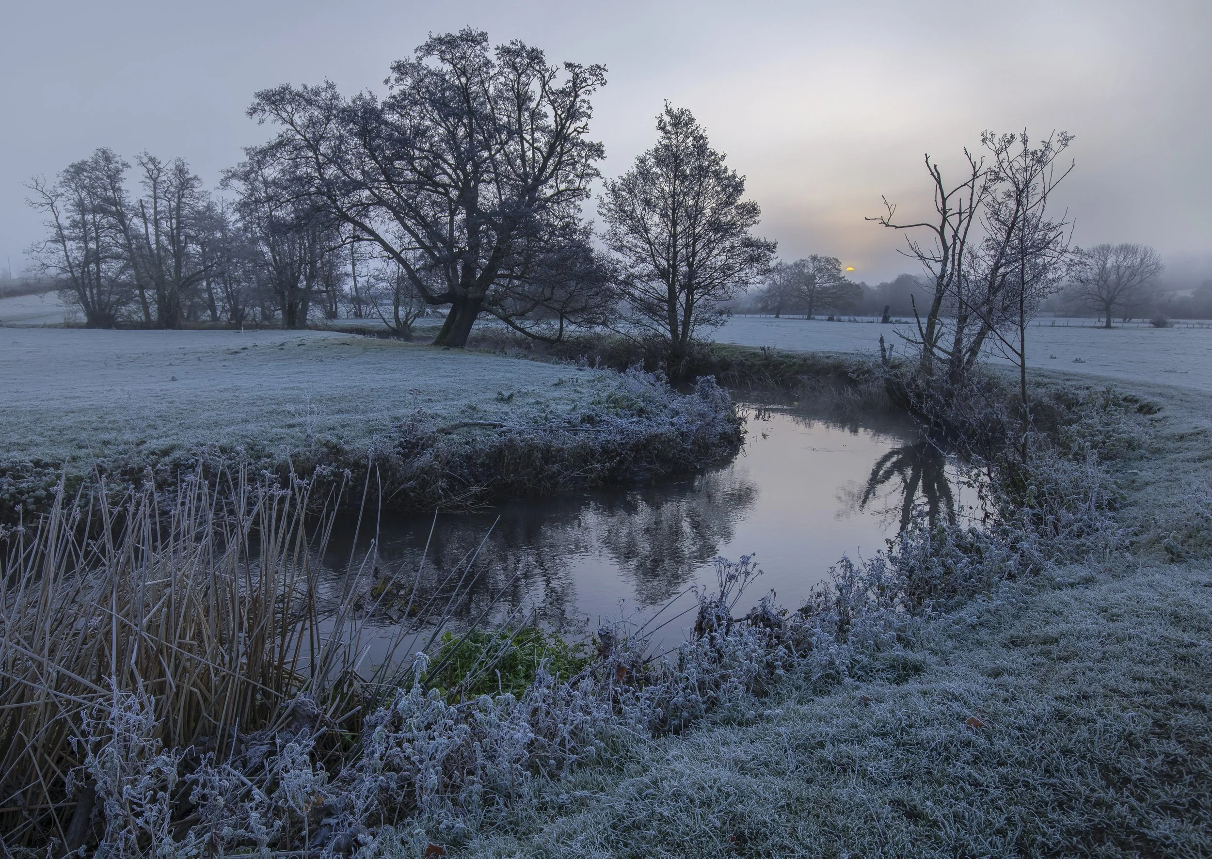 Weak sunrise over the River Colne, Essex.jpg