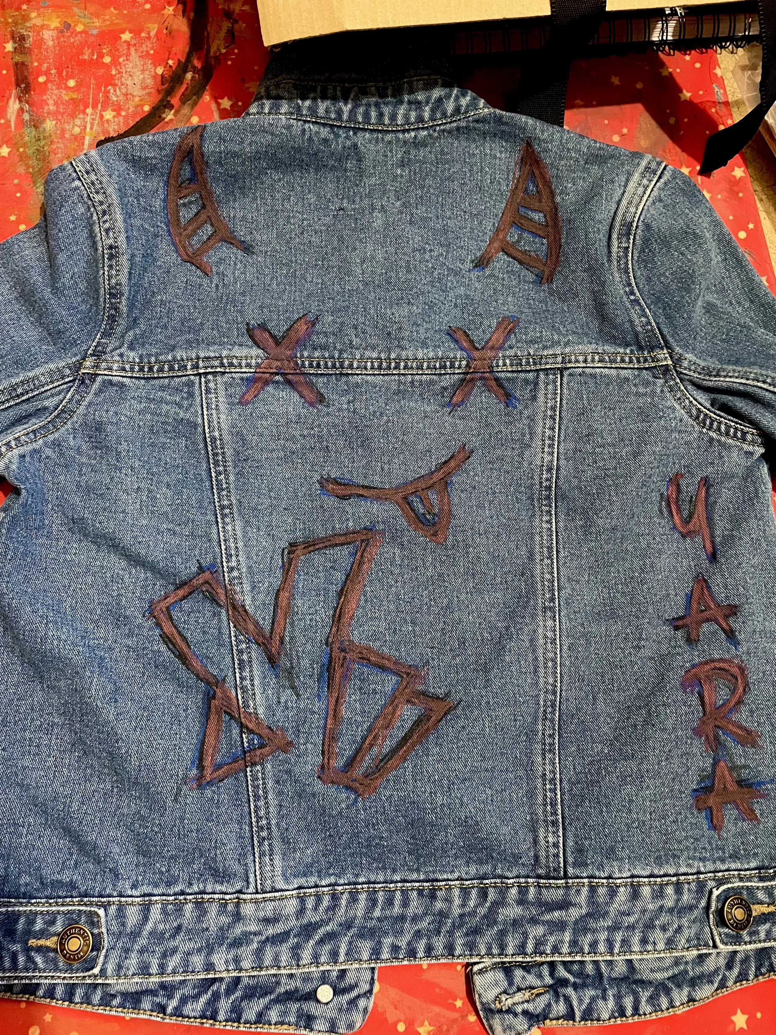 But I ended up really like it, so I decided to paint it on the back of my denim jacket.