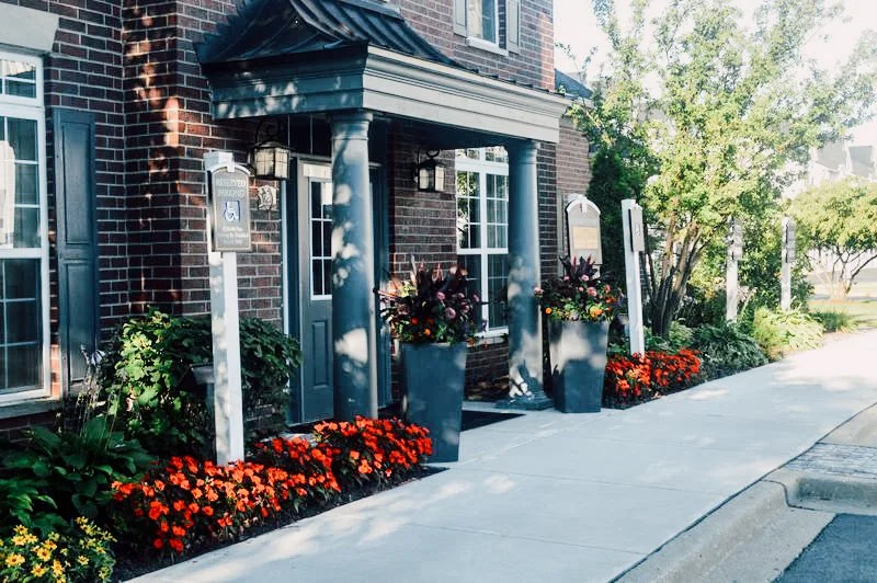 Custom front yard landscape installation at residential property