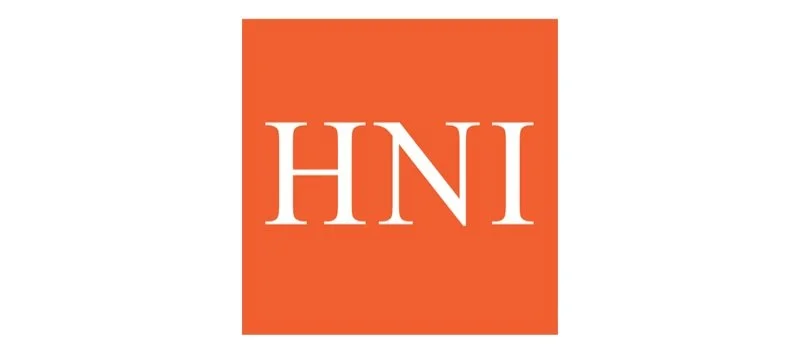 HNI logo with white letters on an orange background