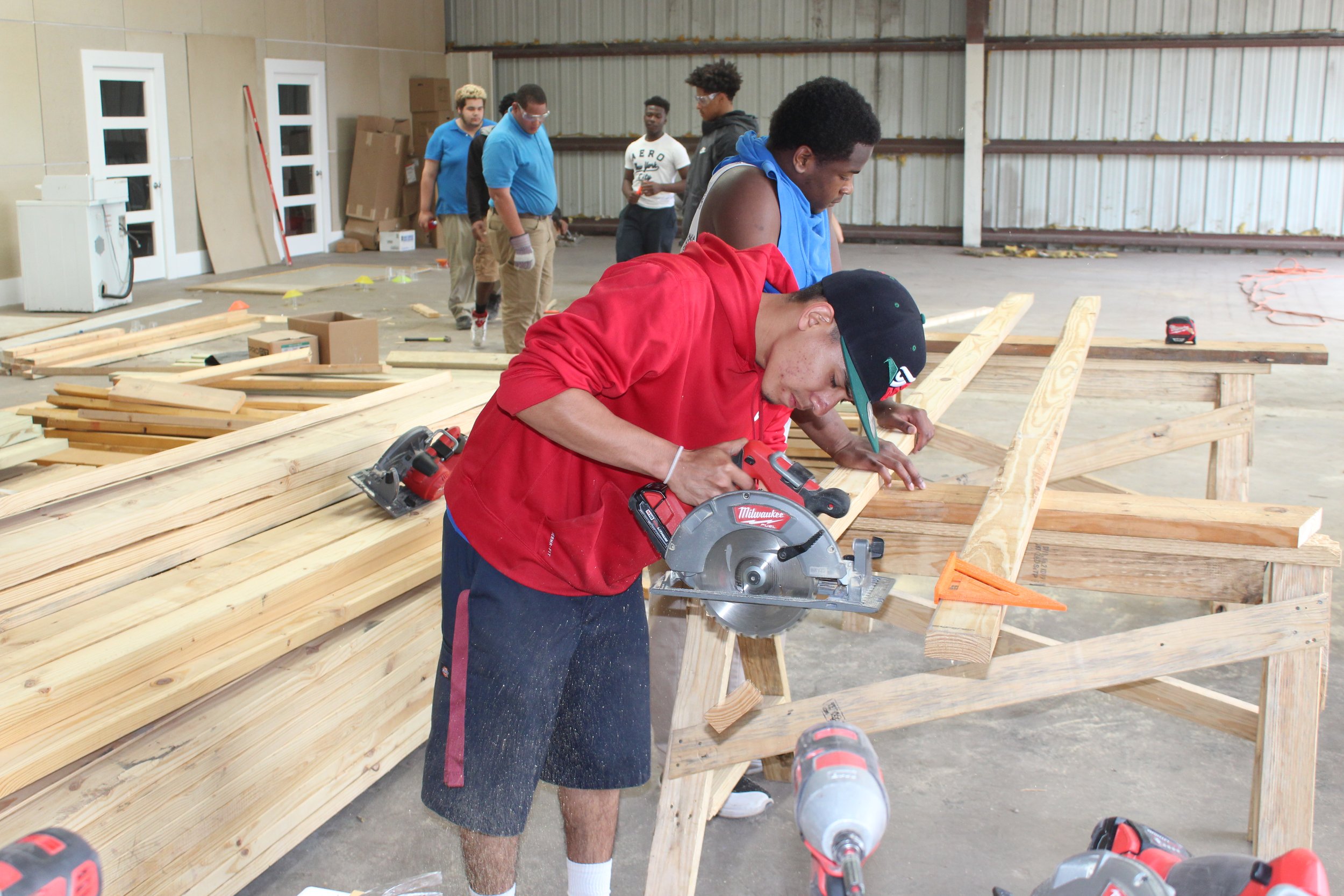 Carpentry class working on building renovations