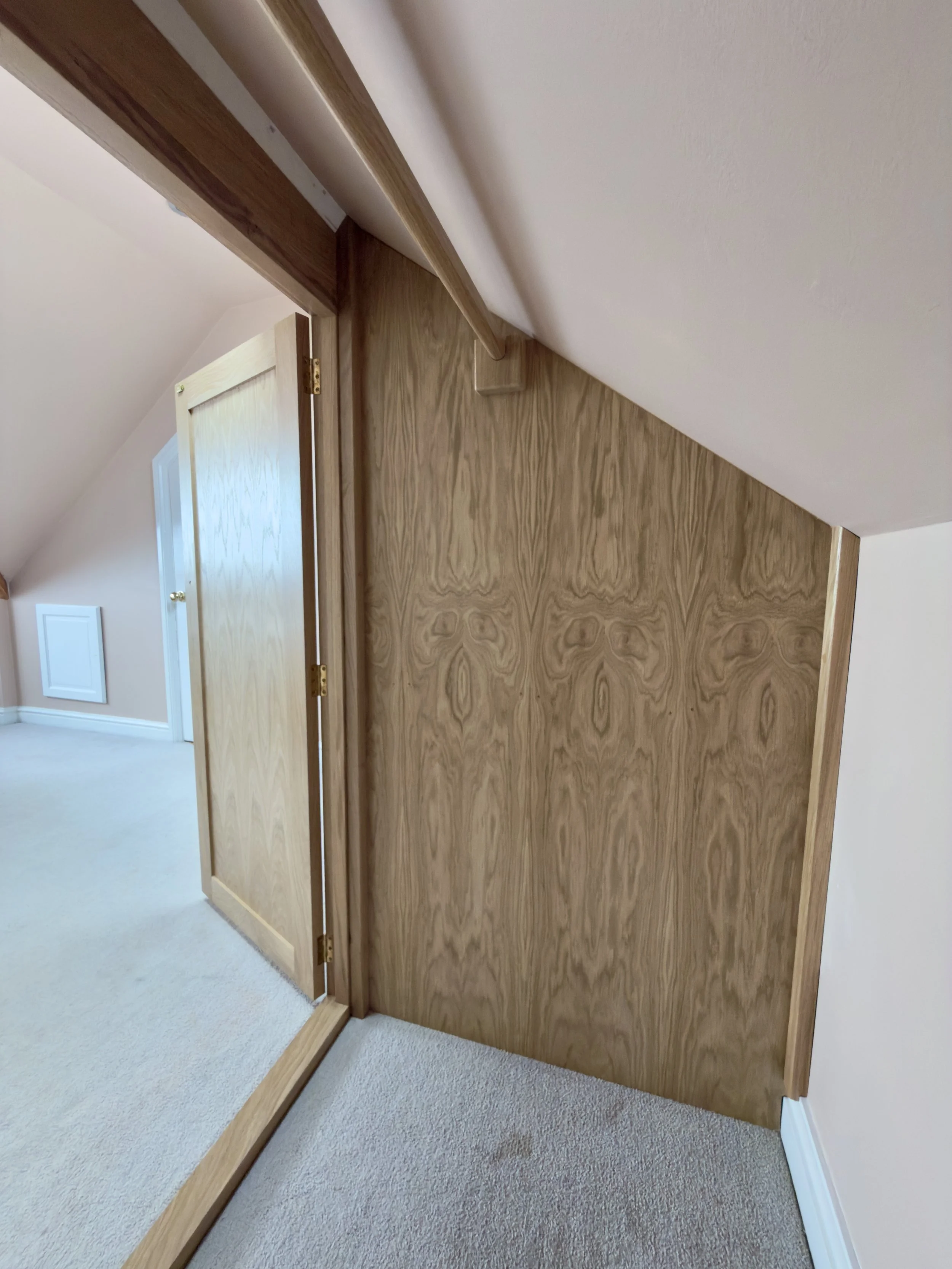 Bespoke oak wardrobe. Clothes hanger. Bedroom storage.