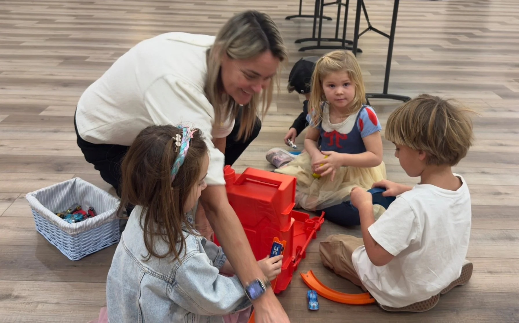 Homeschool Teacher guiding TK students with play