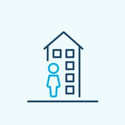 A line icon of a person standing next to a multi-story building or apartment complex.
