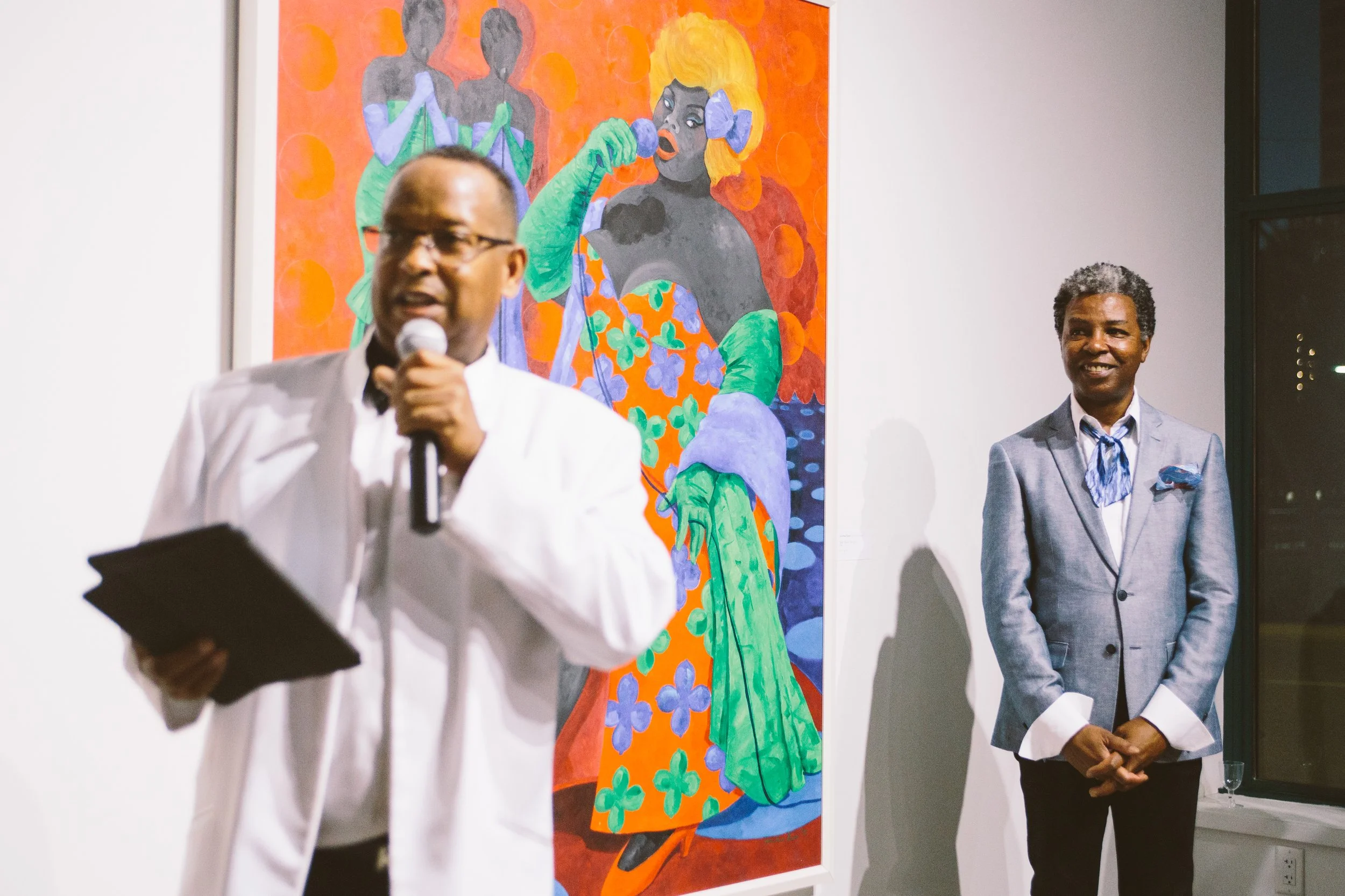 SDAAMFA Director Gaidi Finnie speaks as painter Jonathan Green looks on