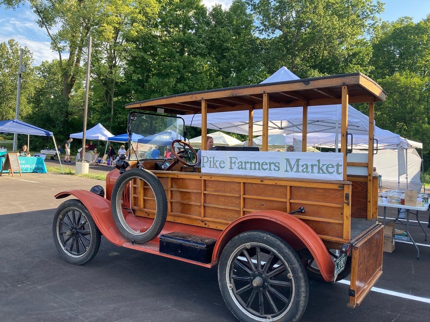 Old wagon car with Pike Farmers Market on the side