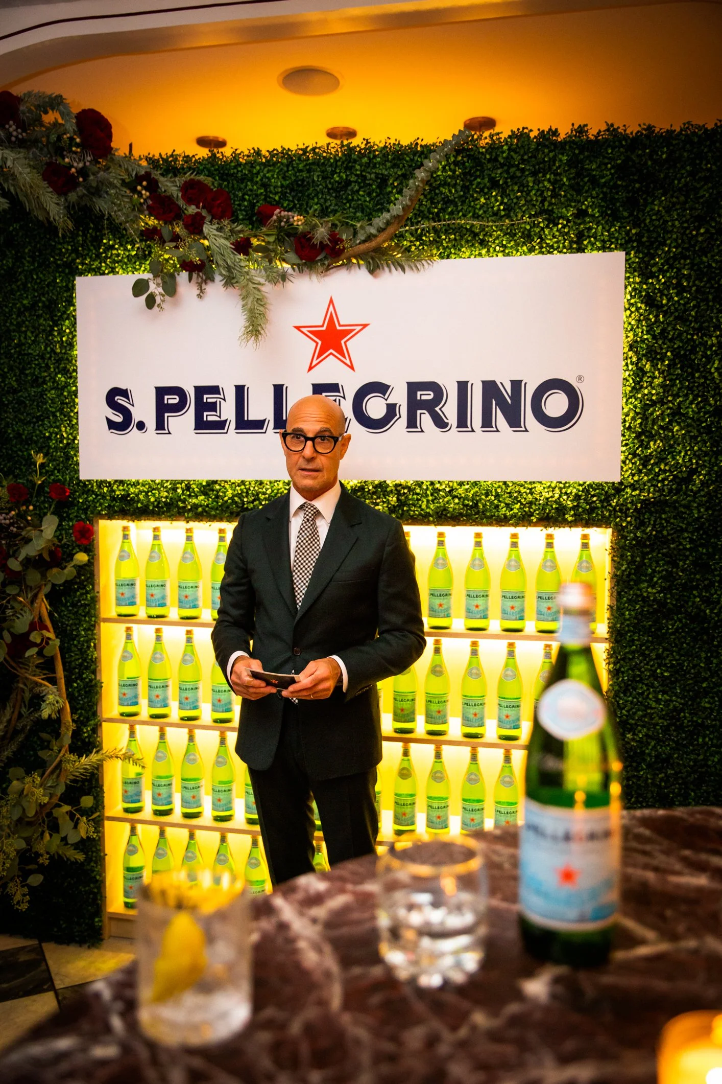 04 Stanley Tucci Welcomes Party Guests.jpg