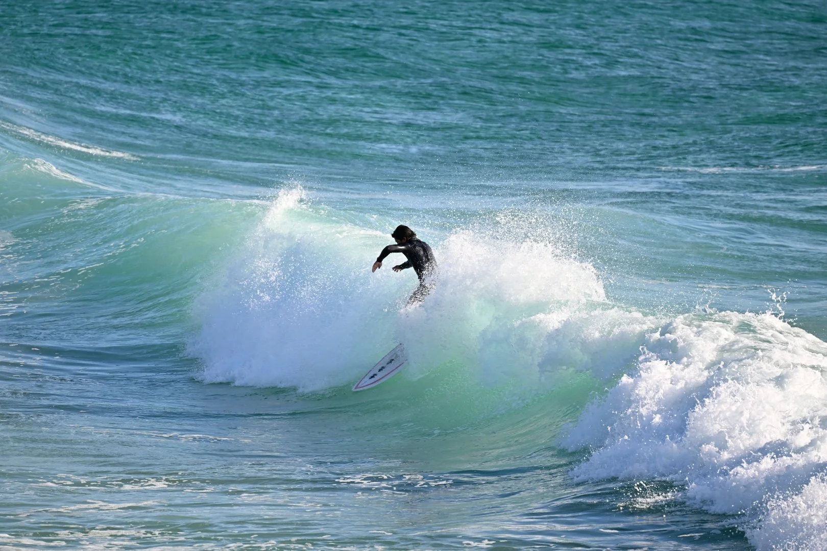 Surfer in the breaks