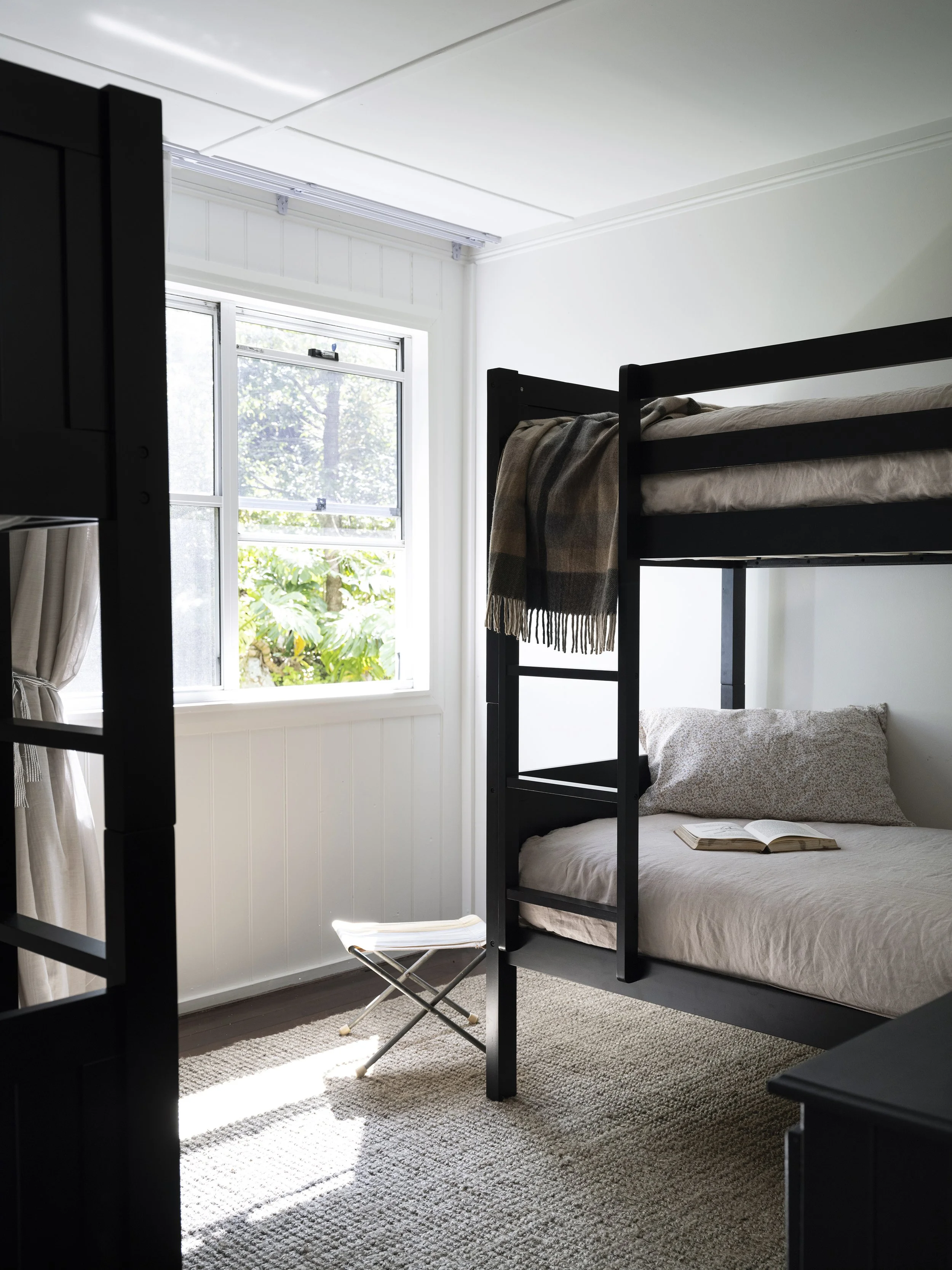 Family-friendly bunk room at Seals Way with minimalist design