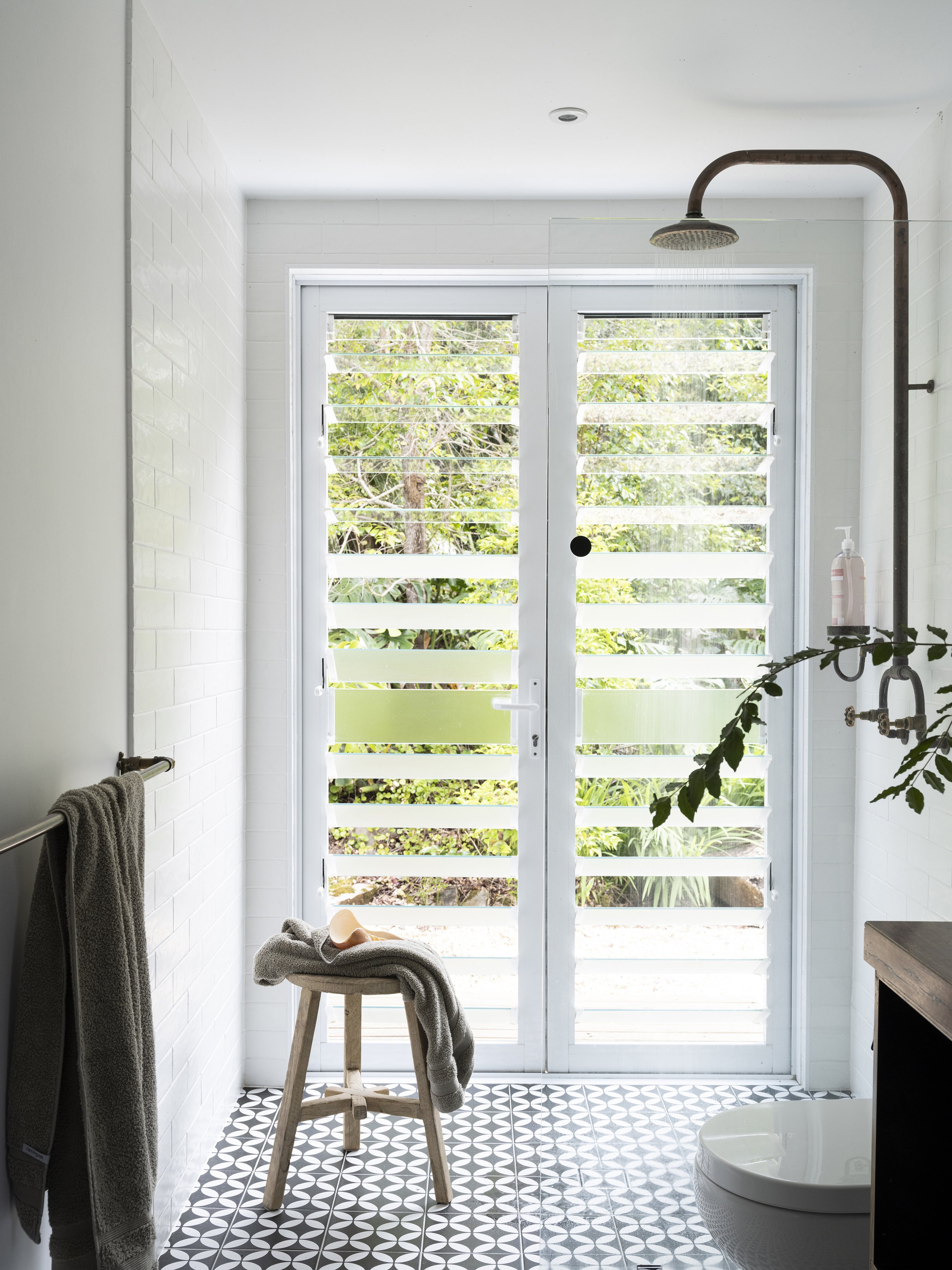Seals Way bathroom with rainfall shower and private deck access