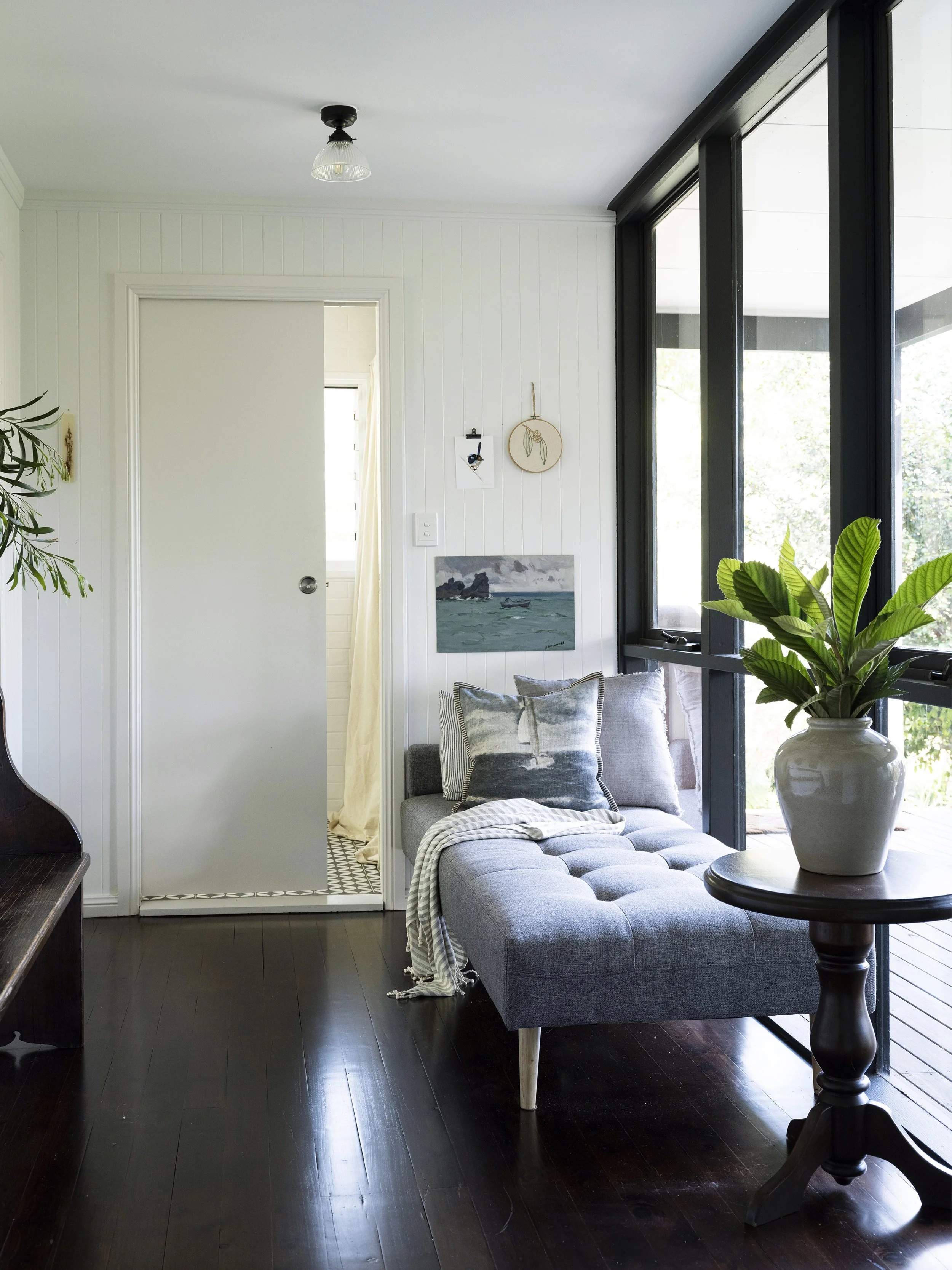 Light-filled passageway leading to outdoor living area at Seals Way
