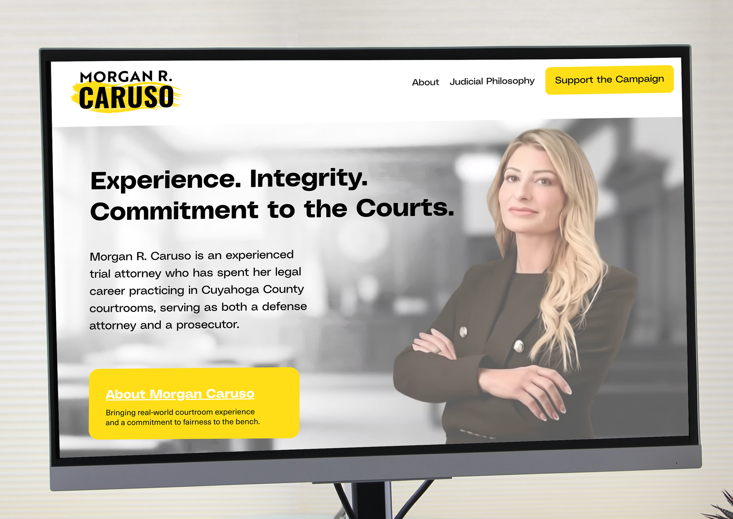 Website homepage for Morgan R. Caruso, a trial attorney, with a photo of Morgan R. Caruso standing with crossed arms. The page features a headline emphasizing experience, integrity, and commitment to the courts, with a call-to-action button labeled "